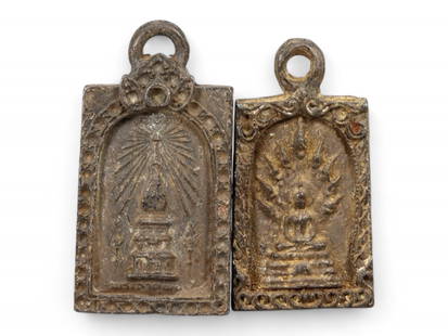 Antique Thai Naga Buddha and Stupa Radiance Bronze Amulets, c. Late 19th-Early 20th Century CE, 83g: This powerful pair of antique Thai bronze amulets, cast in high-relief and aged with natural patina, likely originates from the late 19th to early 20th century CE. Each piece reflects sacred Buddhist