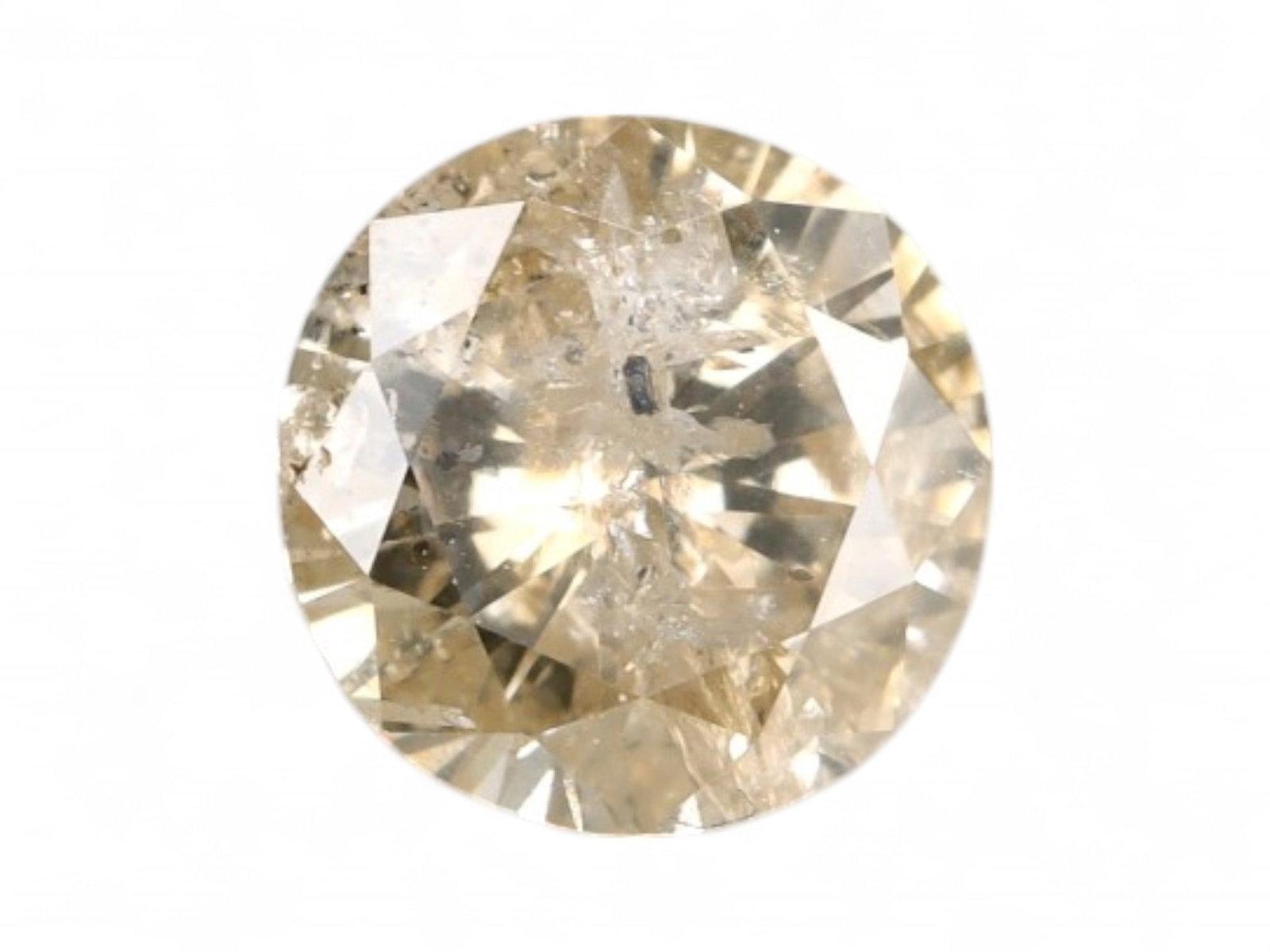 0.69ct Natural FANCY LIGHT CHAMPAGNE Round Brilliant Diamond, 5.6mm: This 0.69 carat natural round brilliant diamond features a graceful light champagne hue with hints of beige and pale gold, lending it a warm, airy brilliance. Measuring 5.6mm, the stone pairs classic 