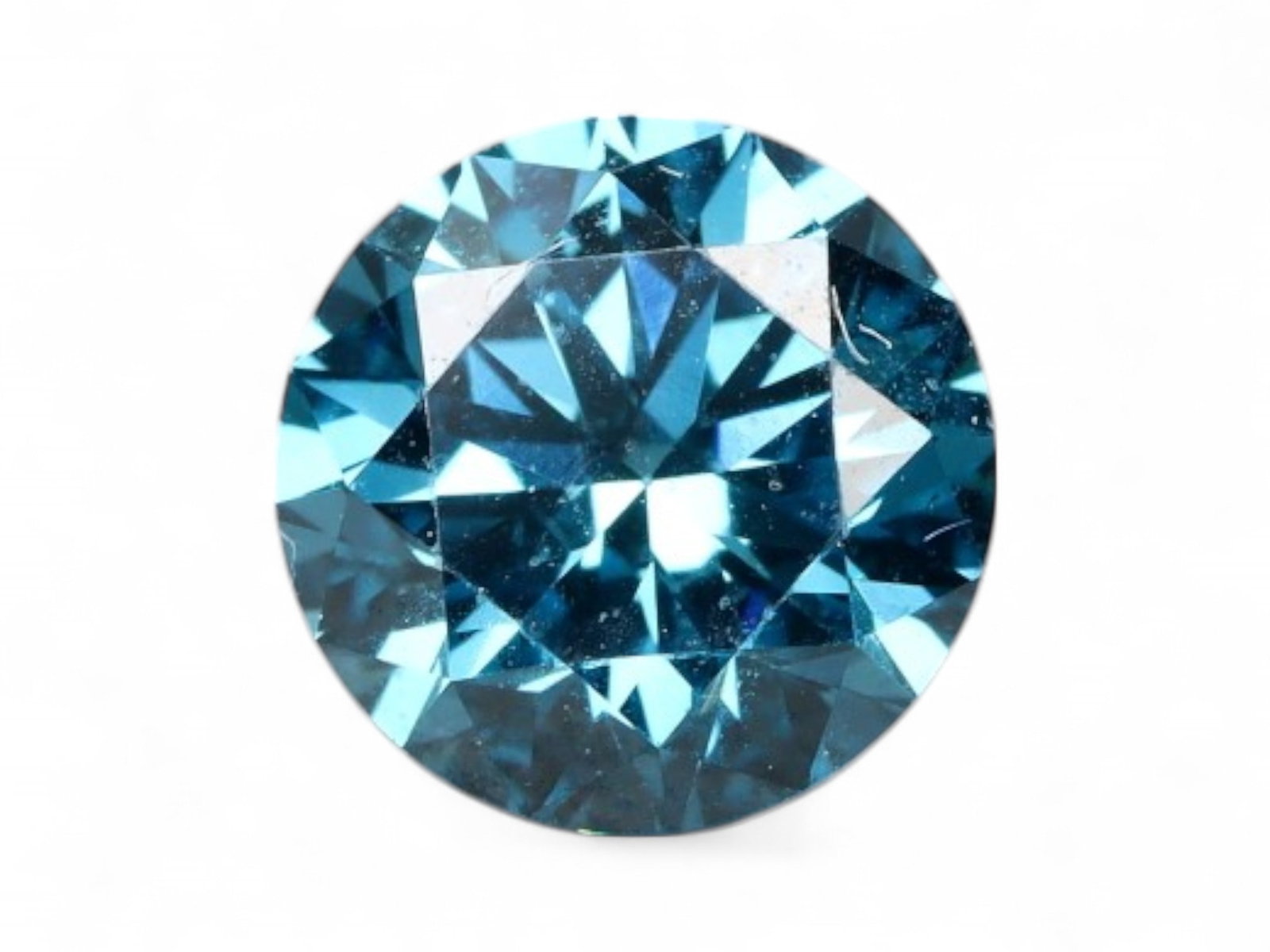 0.61ct Lab-Grown VIVID TEAL BLUE CVD Round Diamond: A showstopping example of lab innovation, this 0.61ct CVD-grown round diamond showcases a saturated vivid teal-blue hue, reflecting icy brilliance and futuristic clarity. Precision-cut with symmetrica