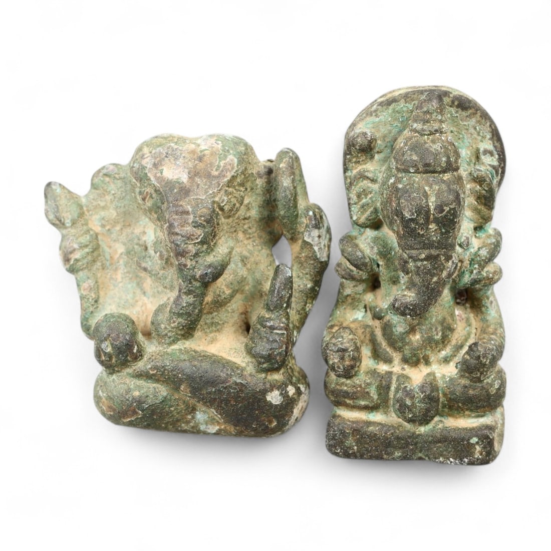 Ancient Himalayan Ganesha Devotional Bronze Figurine Pair, c. 8th-10th Century CE, 91g: This intimate pair of ancient Himalayan bronze figurines, each standing between 3.2 and 3.5 cm tall (approx. 1.25 to 1.4 inches), depicts the revered elephant-headed deity Ganesha in expressive seated