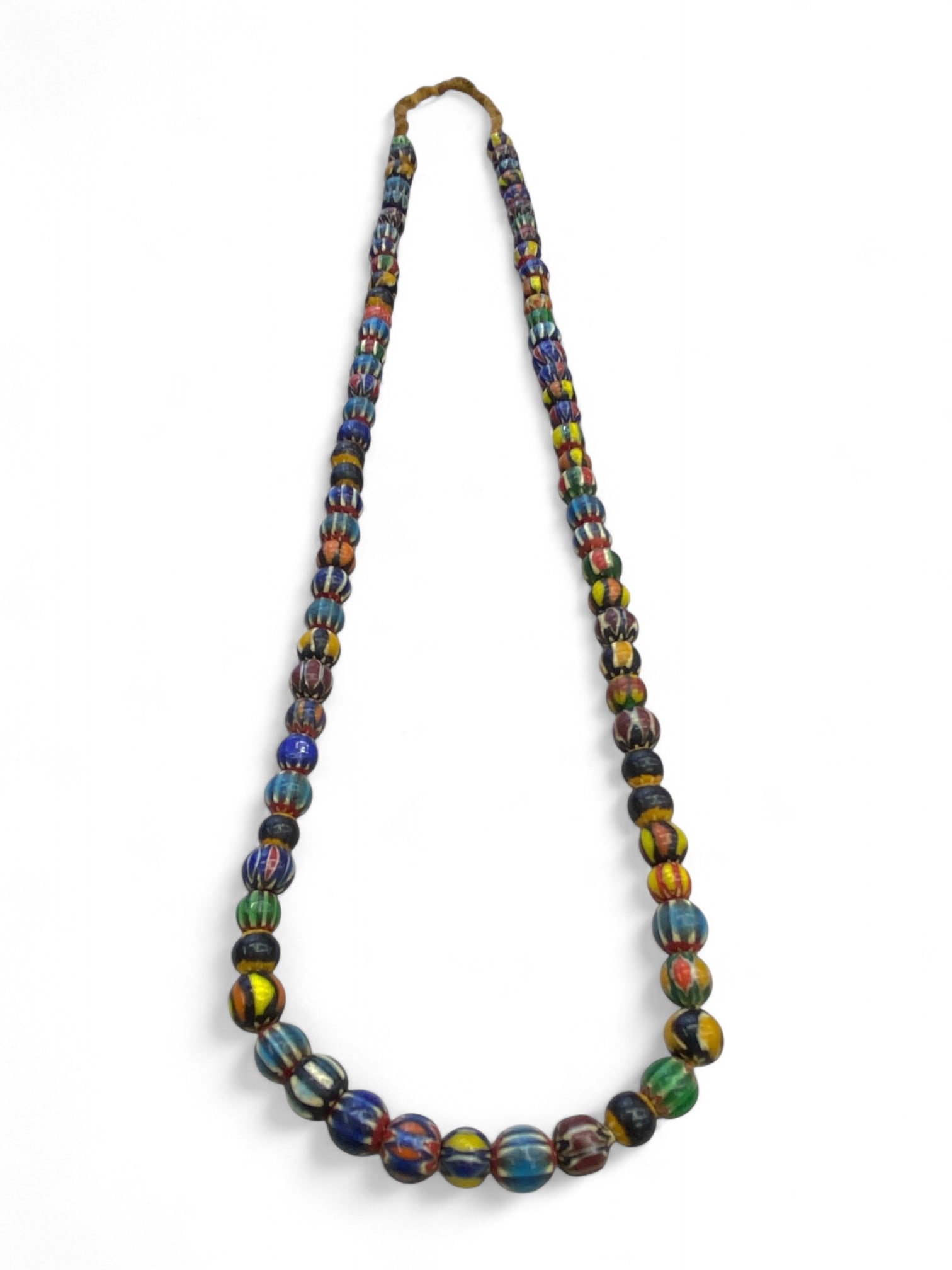 Antique Venetian Chevron Glass Trade Beads Strand Necklace, c. 19th Century CE, 60g: This vivid strand of antique Venetian chevron glass beads, dating to the 19th century CE, is a striking example of the craftsmanship and global influence of Murano glassmakers. Known as "trade beads"