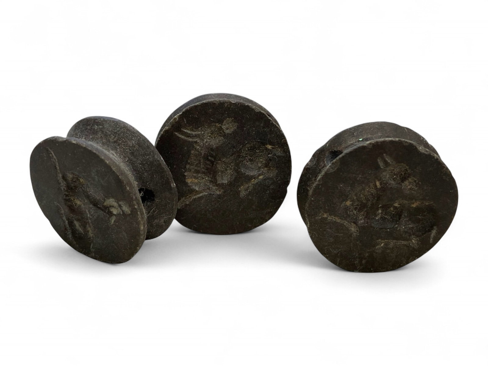 Ancient Sasanian Double Convex Steatite Stamp Seals, c. 3rd-6th Century CE, 33g: These three steatite stamp seals, carved in the distinctive double convex form, originate from the Sasanian Empire, one of the most artistically prolific periods in ancient Persian history. Each seal 
