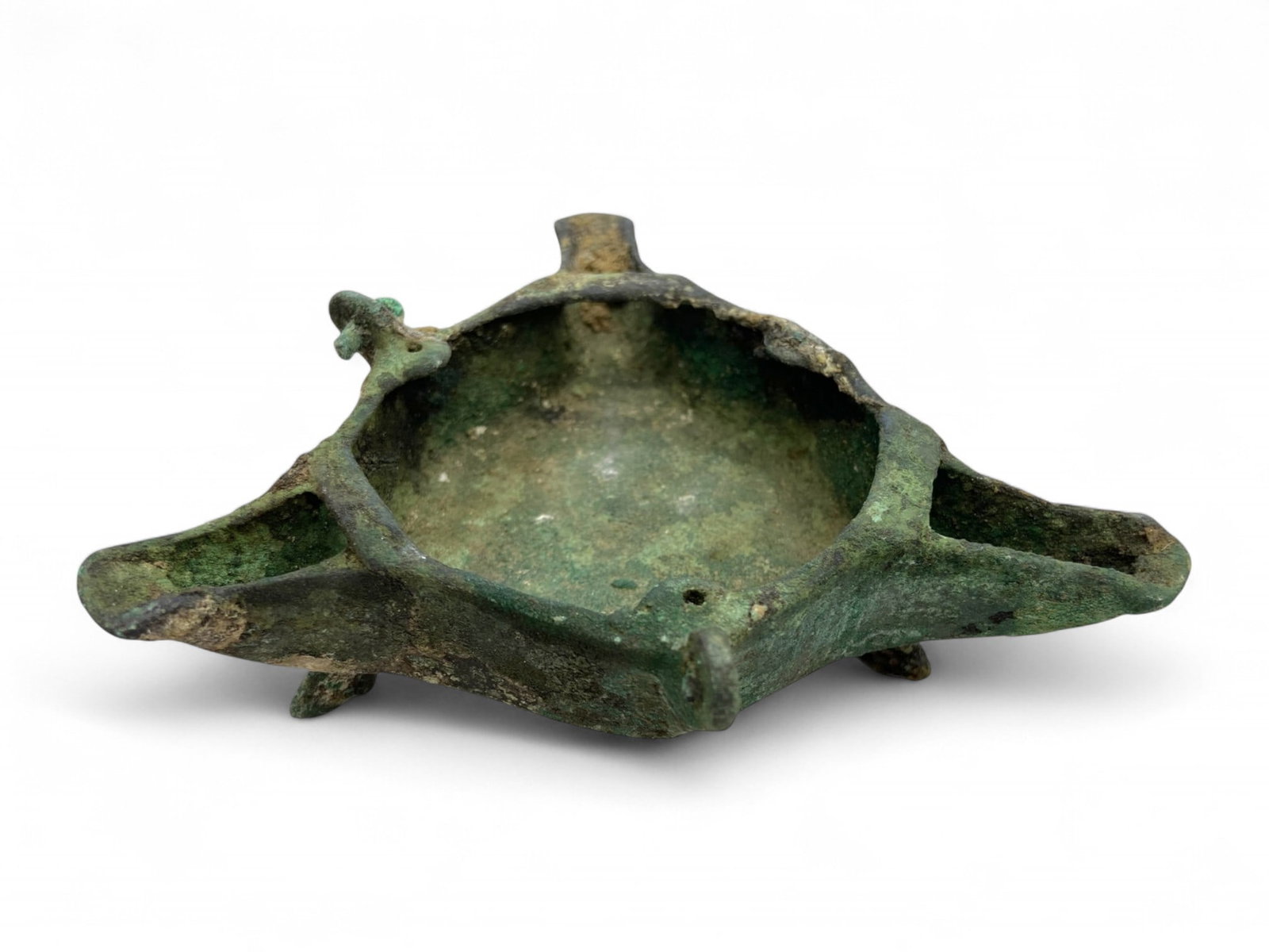 Ancient Near Eastern Bronze Ritual Vessel with Three-Spout Design, c. 1st Millennium BCE, 165g: This unusual and sculptural bronze ritual vessel, originating from the ancient Near East and dating to the 1st millennium BCE, features a rare three-spout configuration radiating from a shallow centra