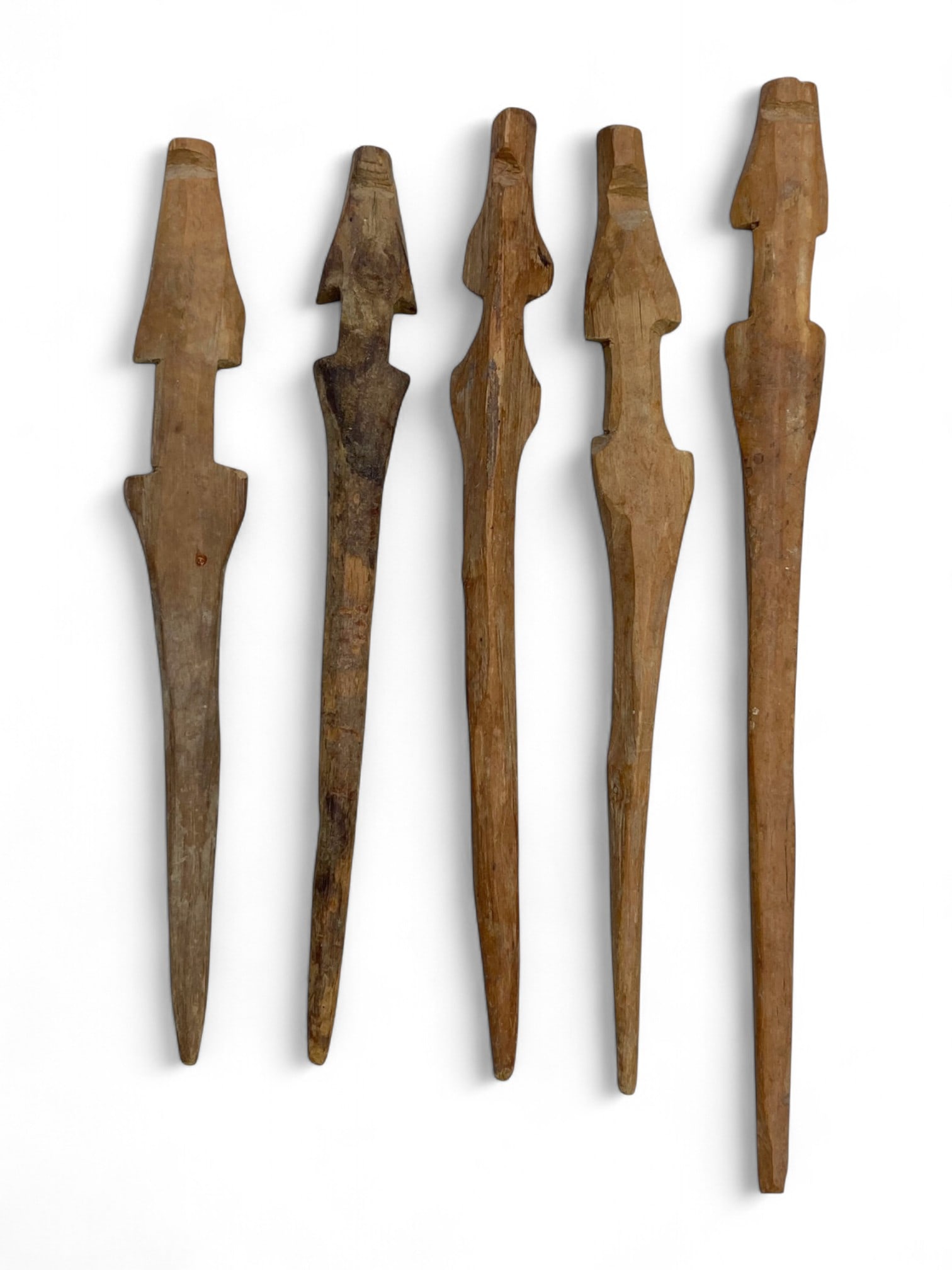 Antique Tribal Wooden Anthropomorphic Idols, Set of 5, 15-19 cm, 53g: This captivating set of five antique wooden idols reflects the enduring legacy of tribal artistry, each piece shaped in a stylized human form with a distinctly minimalist silhouette. Ranging in height