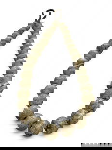 Antique Tibetan Conch Shell Prayer Bead Strand, c. 18th-19th Century CE, 177g: This powerful and tactile strand of antique prayer beads is crafted from naturally aged conch shell, an esteemed material in Tibetan spiritual culture. Dating to the 18th-19th century CE, each spheric