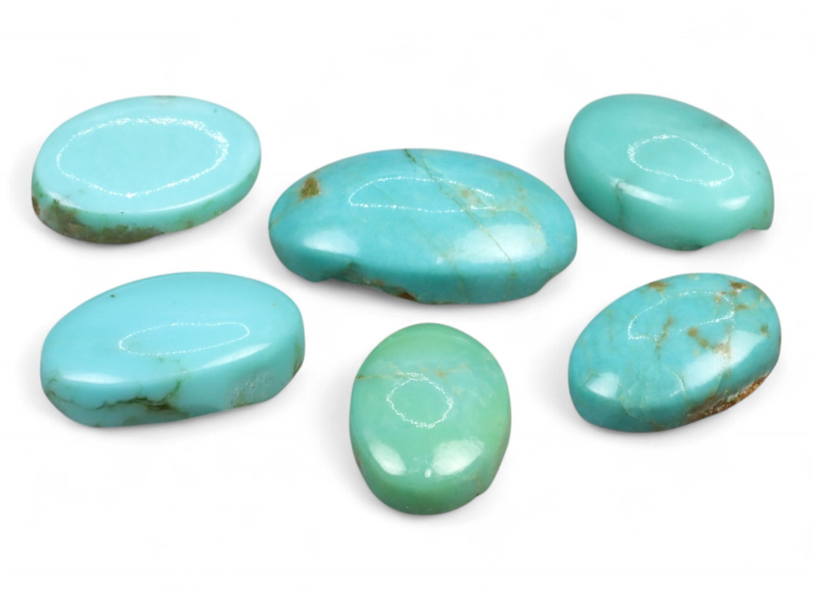 12.70Ct Natural ARIZONA Turquoise Cabochon Parcel Lot: This parcel of Arizona turquoise cabochons showcases the classic robin's egg blue and sea-green hues for which American desert turquoise is renowned. Gently domed and polished to a soft luster, each p