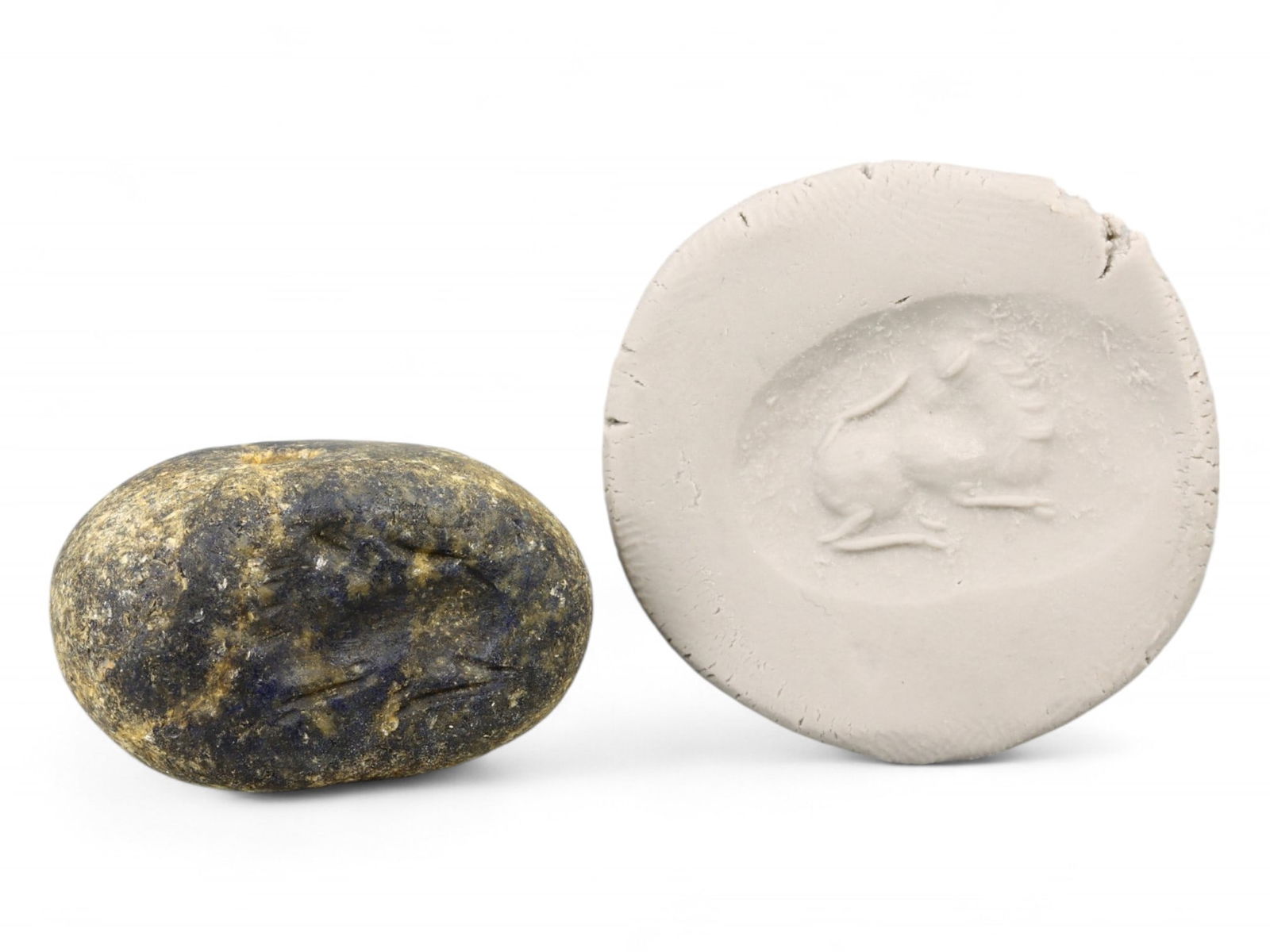 Ancient Akkadian Reclining Ibex Hemispherical Stamp Seal in Lapis Lazuli, 23rd-22nd Century BCE, 17g: This finely carved lapis lazuli hemispherical stamp seal originates from the Akkadian period, a pivotal era in Mesopotamian history known for the unification of Sumerian and Semitic cultures under a c