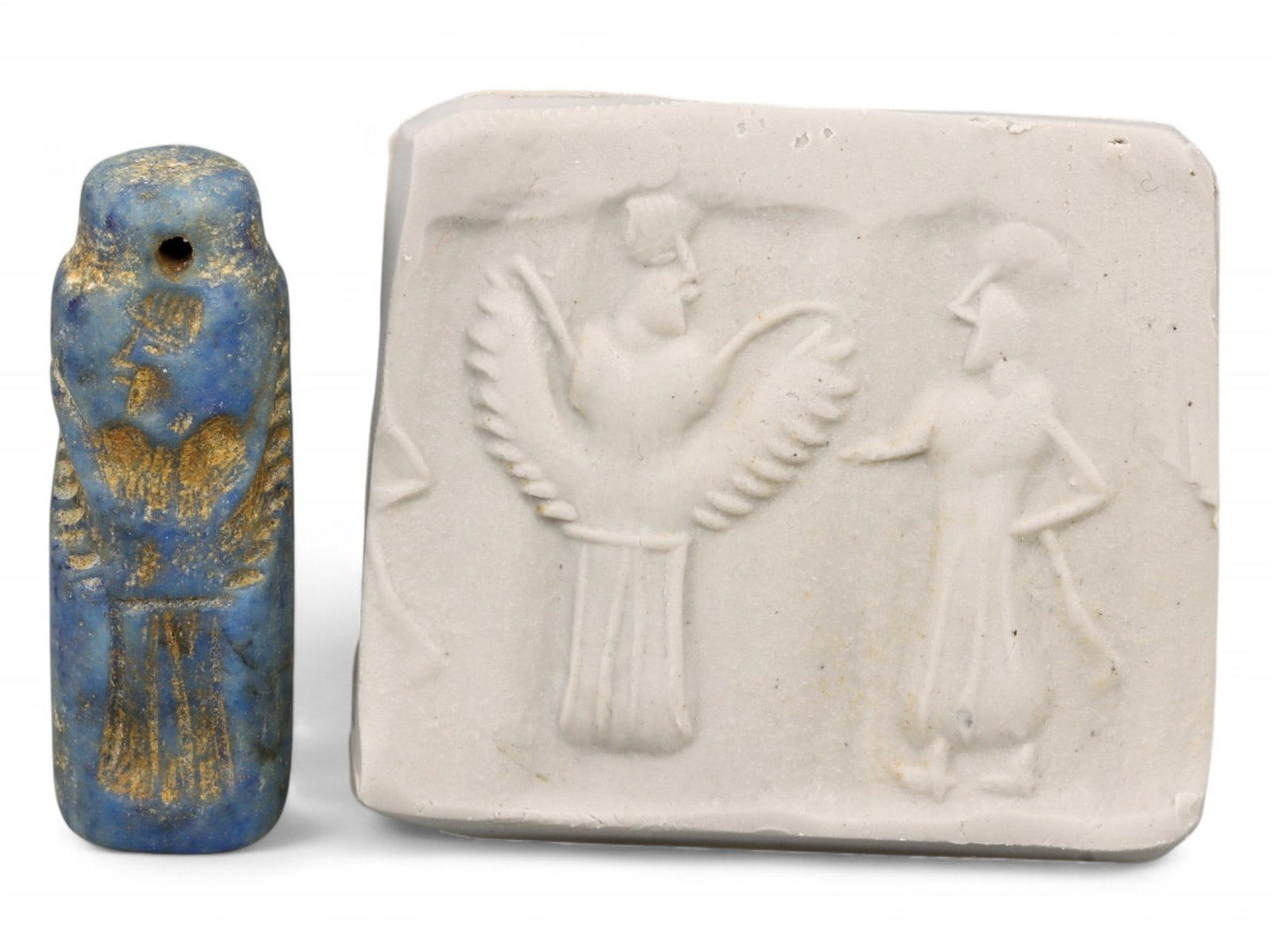 Ancient Neo-Assyrian Winged Genie Cylinder Seal in Lapis Lazuli, c. 9th-8th Century BCE, 6g: This elegant lapis lazuli cylinder seal from the Neo-Assyrian period (c. 9th-8th century BCE) captures one of the most iconic figures in Assyrian mythology-the winged genie. Carved with exceptional cl