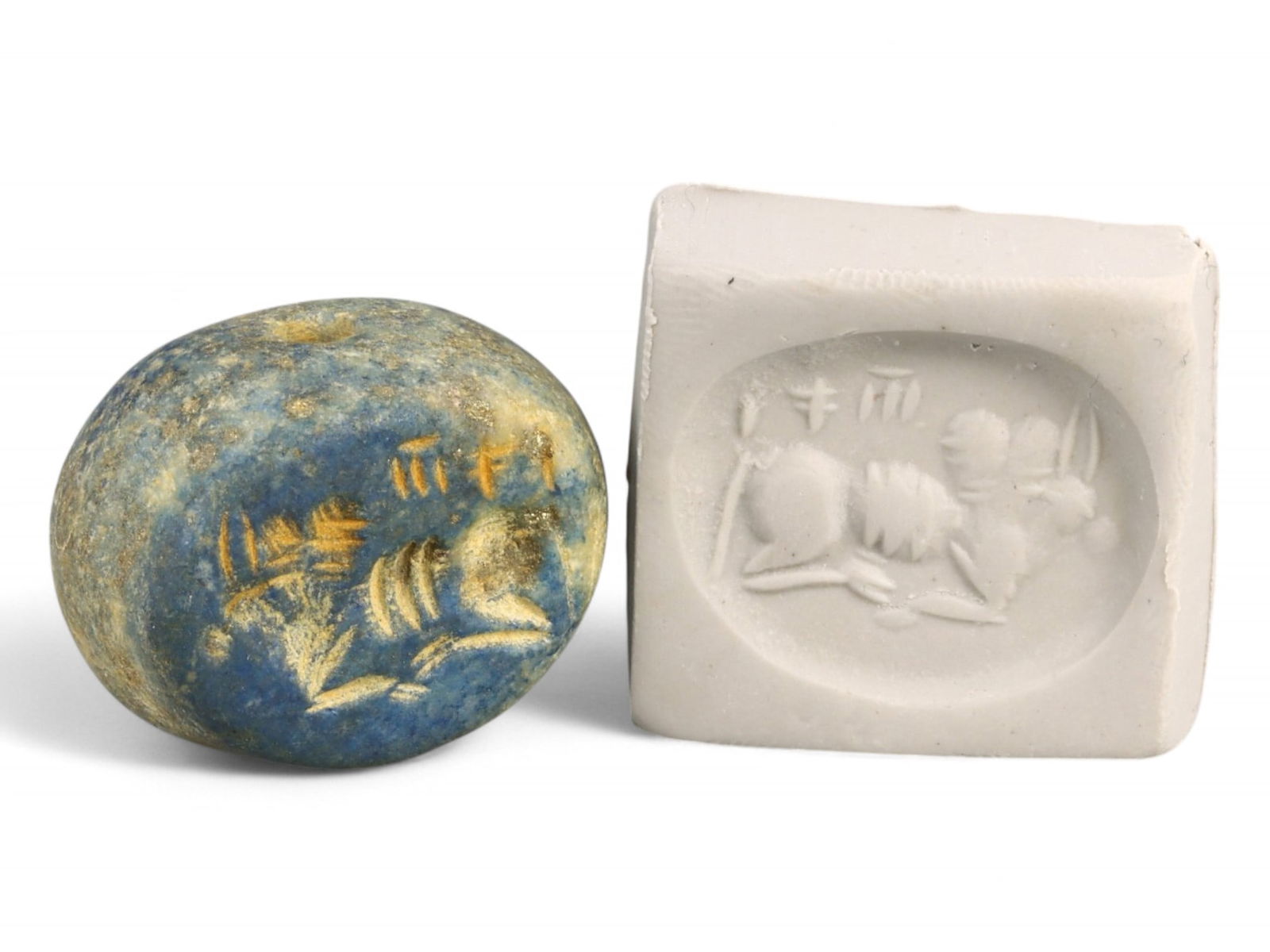 Ancient Elamite Reclining Ibex with Standard Symbols Lapis Lazuli Stamp Seal, c. 2500-1800 BCE - 14g: This rare and finely executed Elamite stamp seal, carved from vivid lapis lazuli, depicts a reclining ibex flanked by divine standards and cuneiform-like markings-an image brimming with spiritual symb