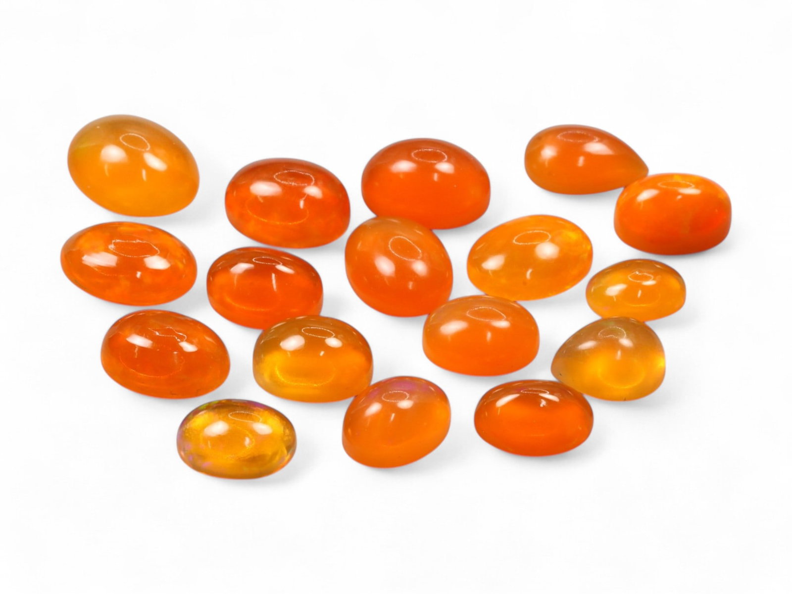 16.10Ct Natural ETHIOPIAN WELO Opal Color-Enhanced Cabochon Parcel: This vivid parcel of Ethiopian Welo opal cabochons bursts with fiery orange hues, the result of expert color enhancement that amplifies their natural translucence. The cabochons are smoothly polished 