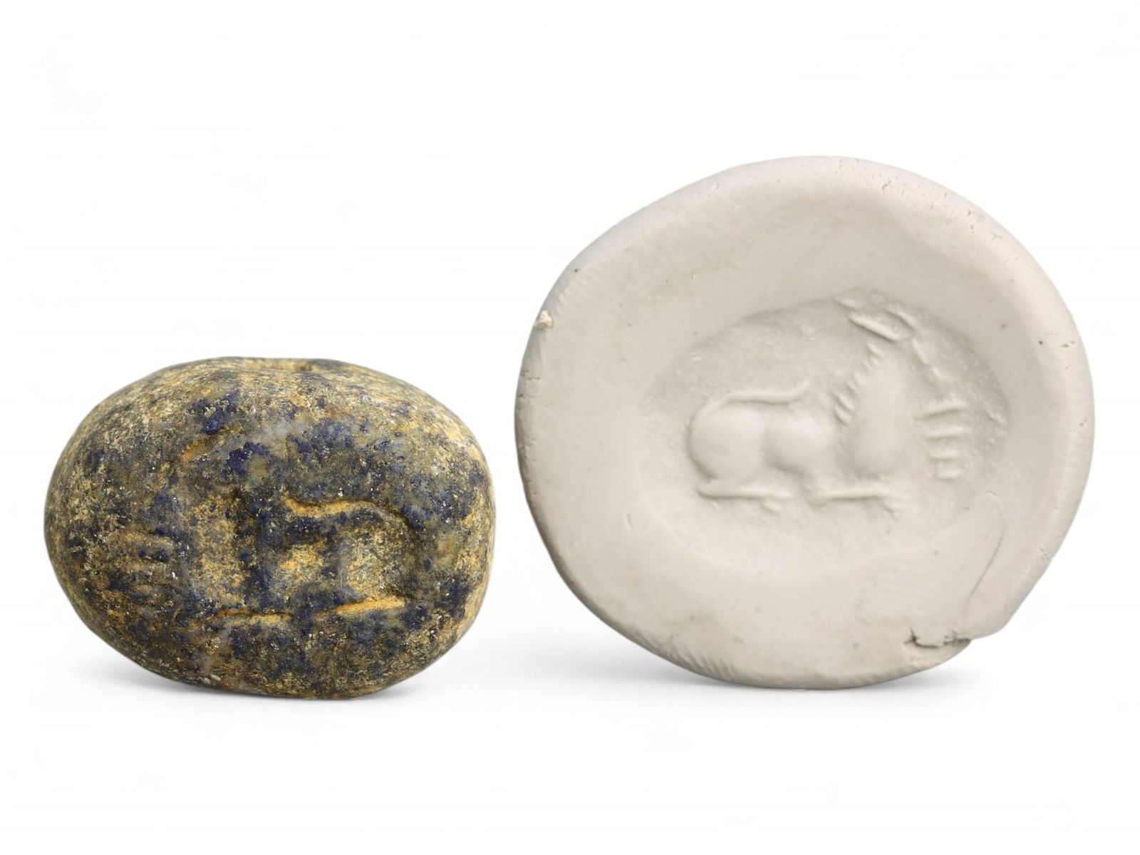Ancient Elamite Hemispherical Reclining Ibex Lapis Lazuli Stamp Seal, c. 2200-1800 BCE, 16g: This substantial hemispherical stamp seal, carved from richly mottled lapis lazuli, exemplifies the spiritual and artistic character of Elamite glyptic art during the late 3rd to early 2nd millennium