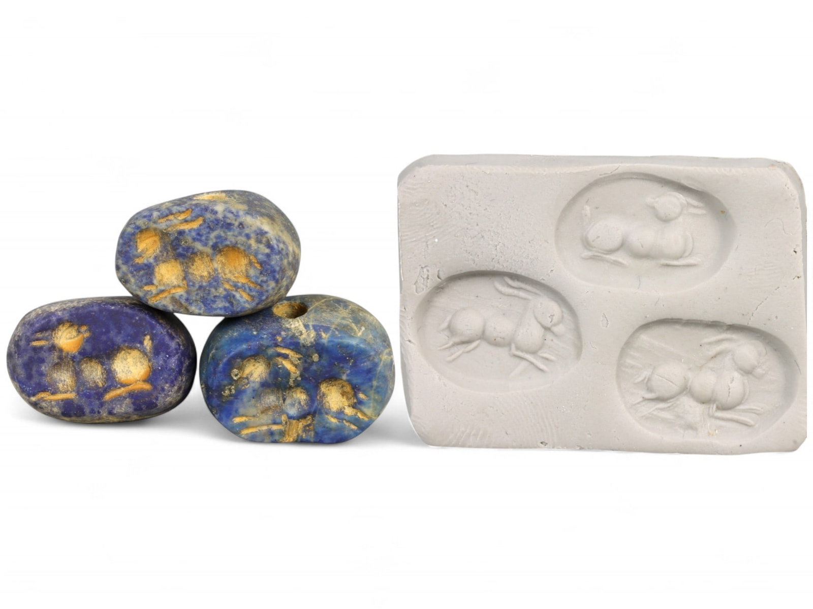 Ancient Akkadian Trio of Antelope Motif Lapis Lazuli Stamp Seals, c. 2350-2150 BCE, 20g: This rare ensemble of three Akkadian stamp seals, exquisitely carved in lapis lazuli, forms a dynamic miniature gallery of Mesopotamian artistry. Each elliptical seal, measuring approximately 2 cm (0.