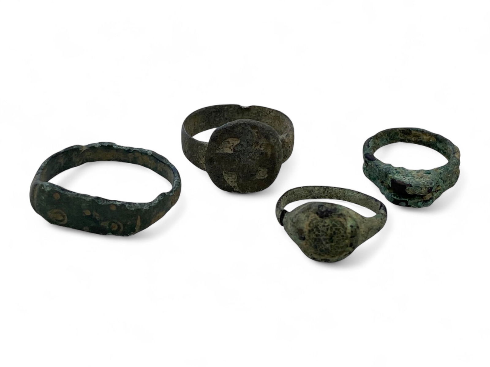 Ancient Roman Bronze Rings Set with Symbolic Bezel Forms, c. 1st-3rd Century CE, 10g (4 Rings) (1 of 2)