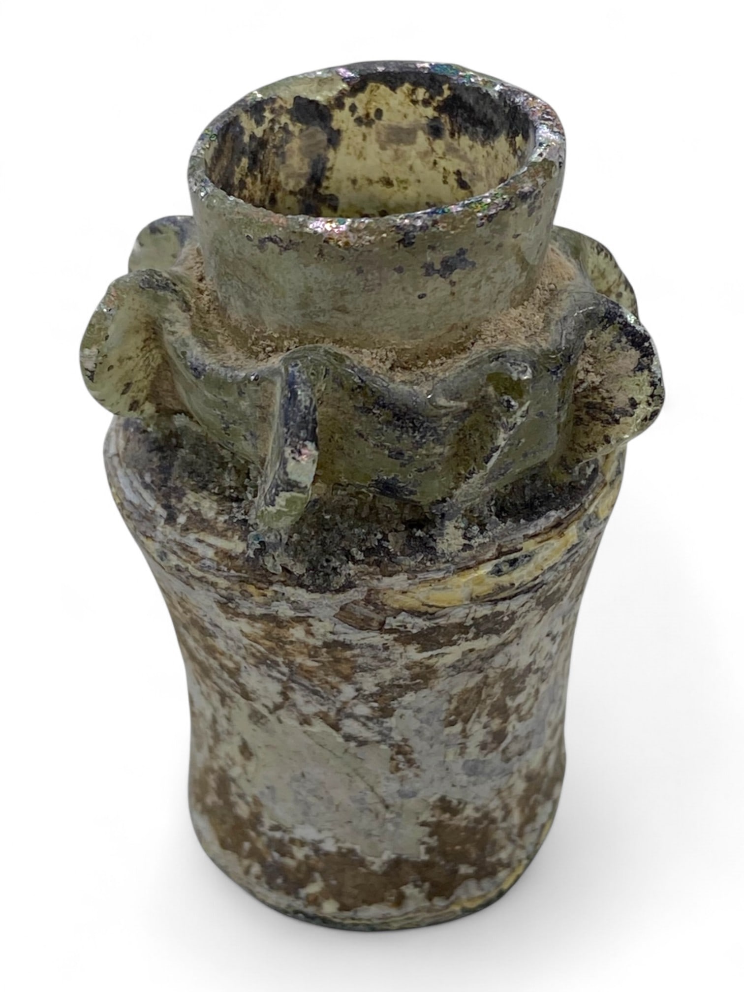 Ancient Roman Ribbed Rim Miniature Glass Flask, c. 1st-3rd Century CE, 49g: This petite Roman glass flask, standing at 6 cm and weighing 49 grams, captures the elegance and inventiveness of early imperial glassmaking. Crafted during the 1st to 3rd century CE, this vessel like