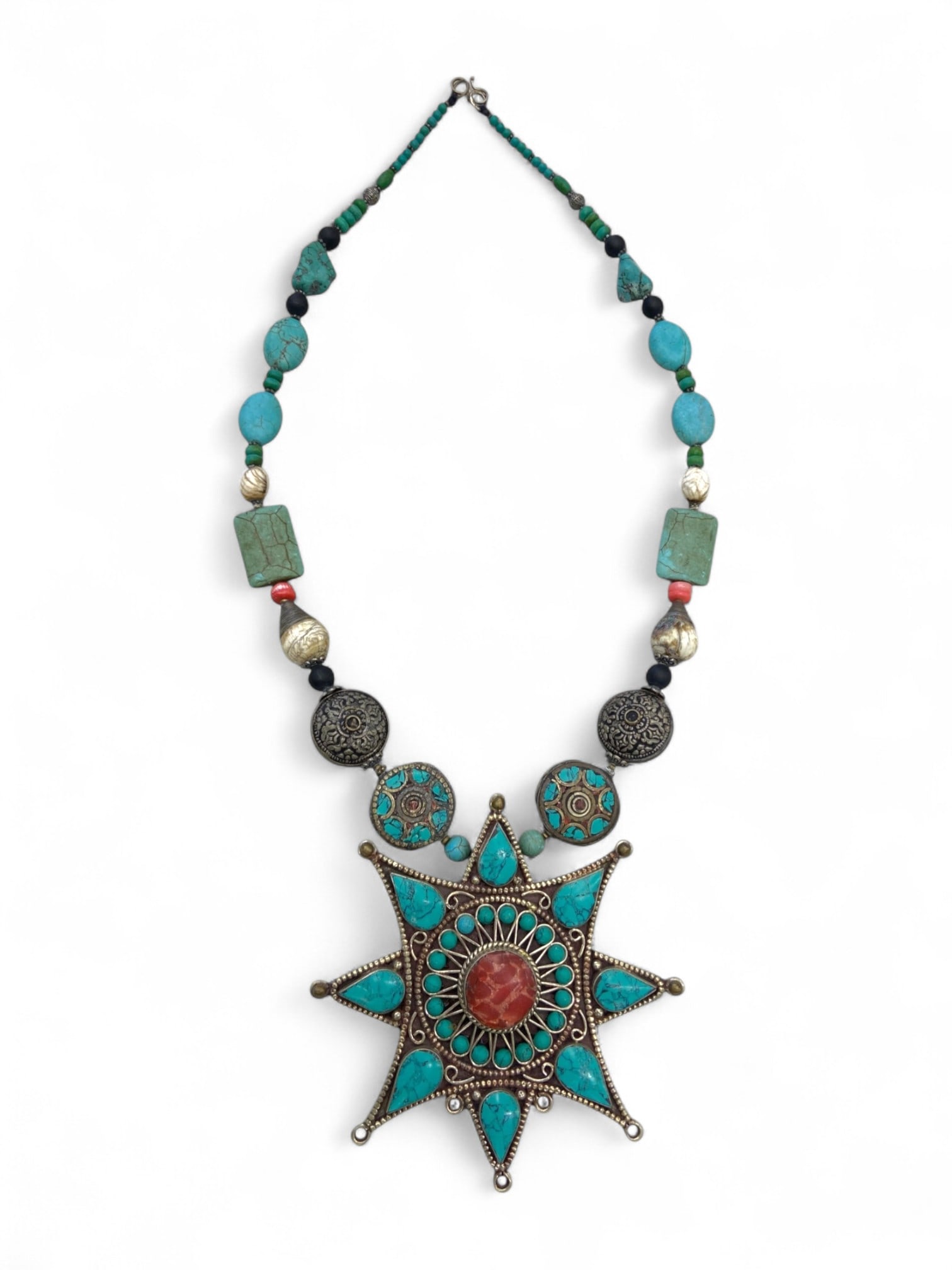 Central Asian Tribal Starburst Motif Inlay Pendant Necklace with Carnelian and Turquoise, 175g: This powerful tribal necklace centers around a bold eight-point starburst pendant, richly inlaid with teardrop-shaped turquoise stones and a domed carnelian at its core. Weighing approximately 175 gra
