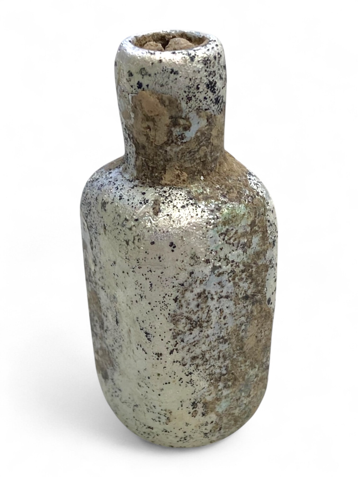 Ancient Roman Silver-Iridescent Glass Unguentarium Bottle, c. 1st-3rd Century CE, 29g: This delicately formed ancient Roman glass unguentarium, dating to the 1st-3rd century CE, was once a vessel for storing precious oils, perfumes, or medical preparations. Weighing 29 grams (1.02 oz),