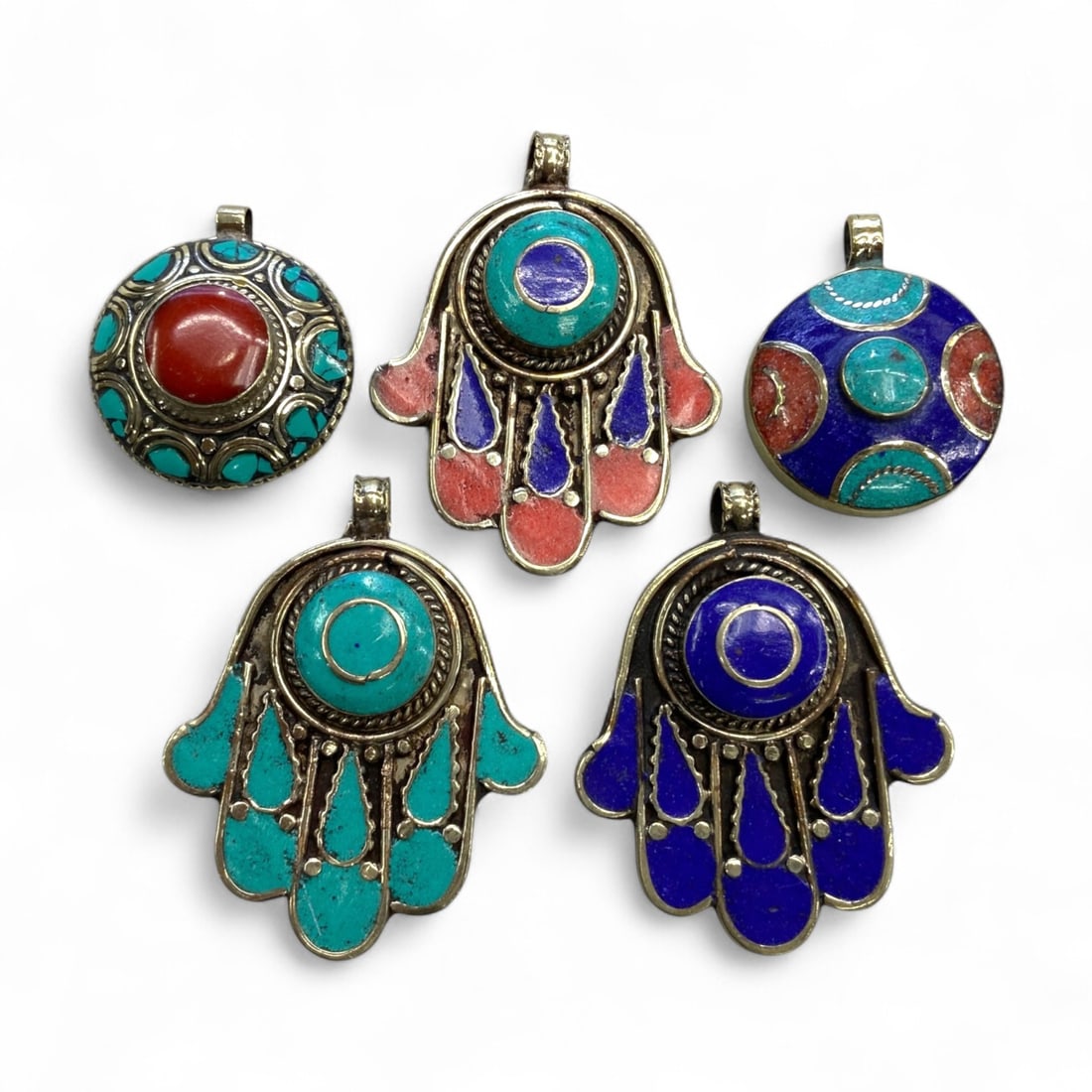 Antique Tribal Hamsa and Mandala Enamel Pendants, North Africa or Central Asia, 151g: This vibrant collection of five antique tribal pendants captures the bold spirit and protective symbolism of nomadic cultures from North Africa or Central Asia. Rich in color and folkloric artistry, t