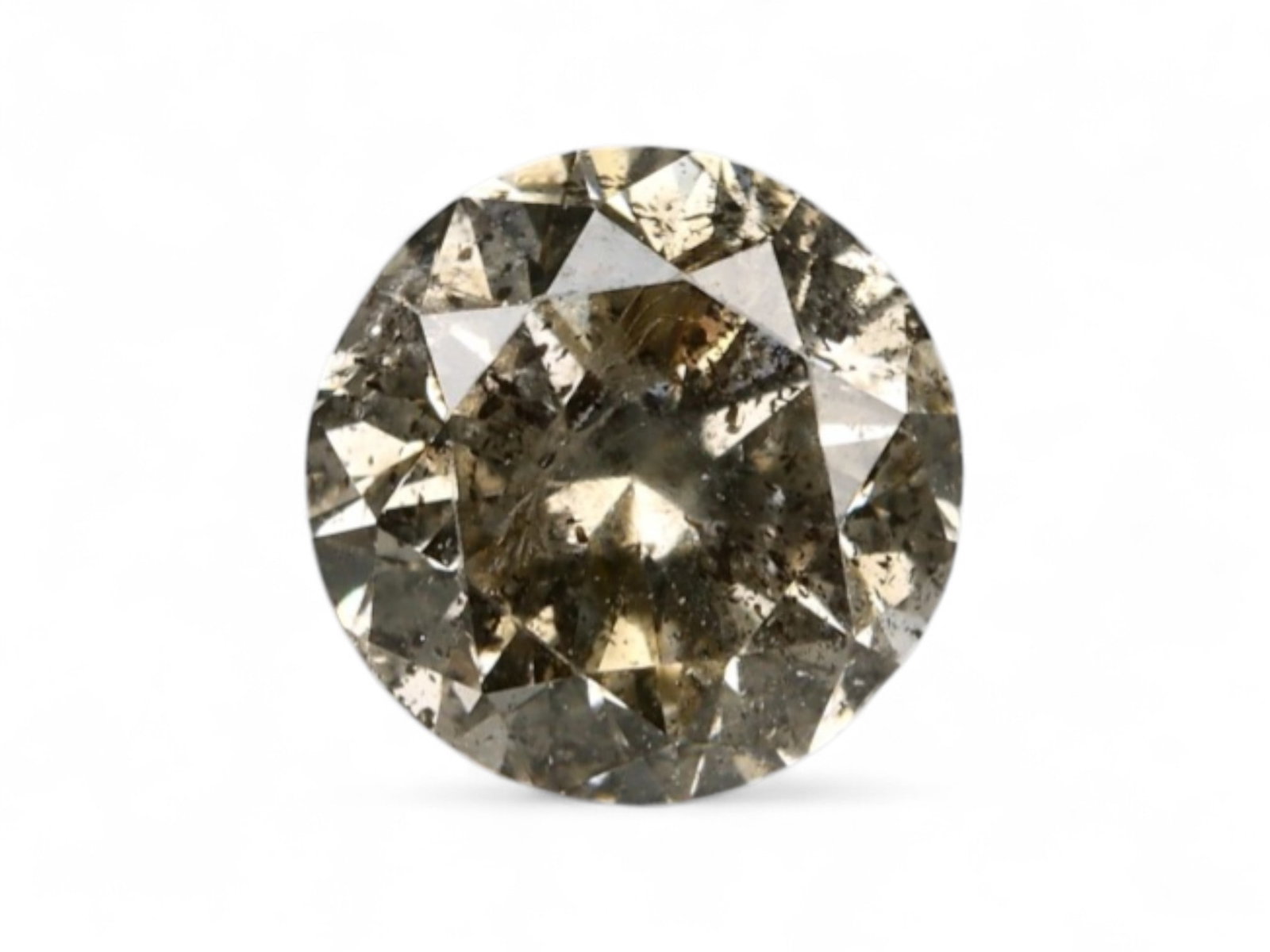 0.57Ct Natural Matrix Earth-Tone Round Brilliant Diamond, 5.0mm: A bold expression of natural inclusions and warm mineral tone, this round brilliant diamond features a richly mottled surface of coffee, slate, and silvery flecks. The internal matrix gives the stone 