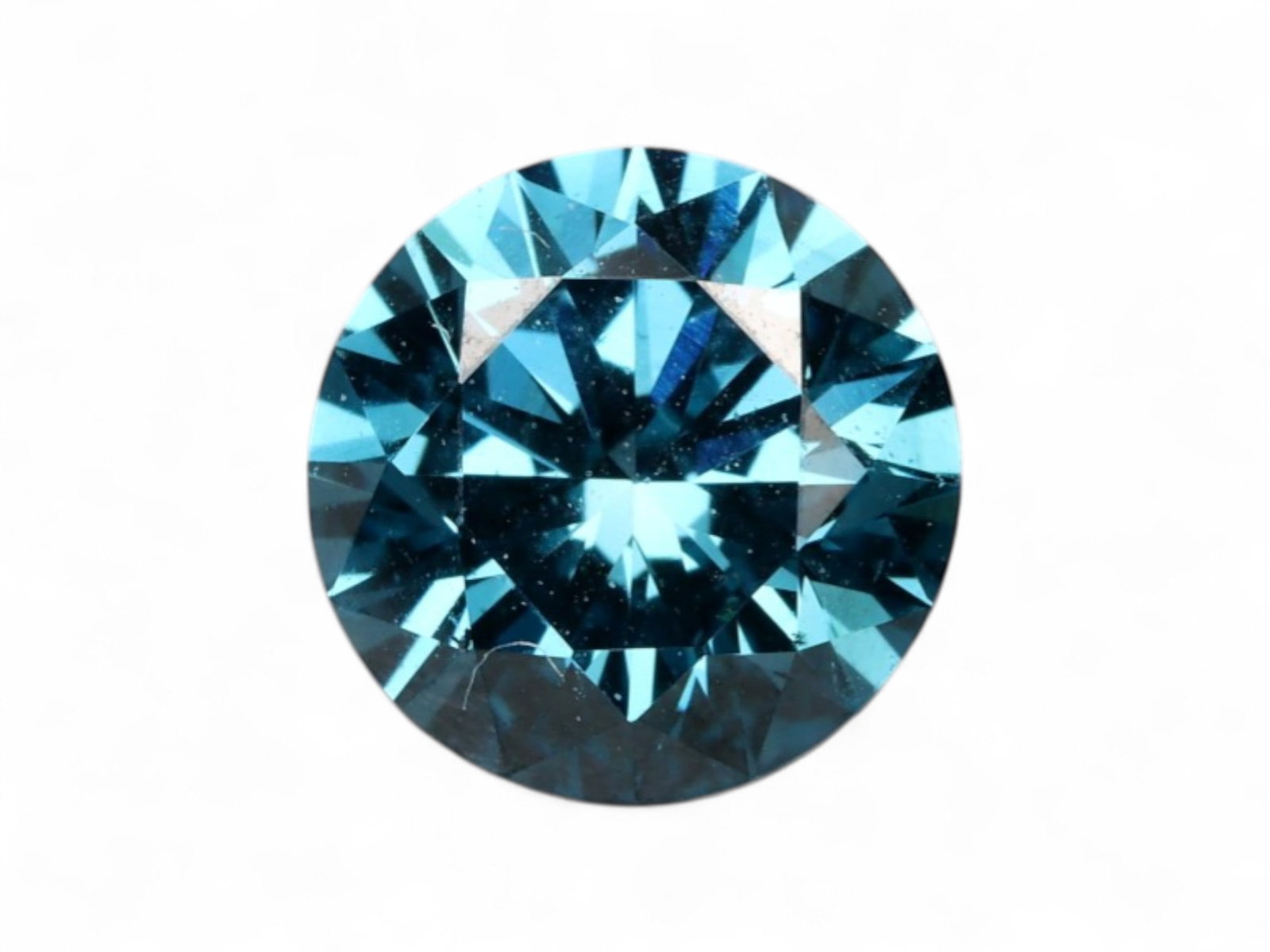 0.85Ct Lab-Grown Oceanic Blue Round Brilliant Diamond: Striking in hue and precision-cut brilliance, this lab-grown blue diamond features a classic round brilliant profile with intense teal-to-midnight color play. Symmetrically faceted and highly polished