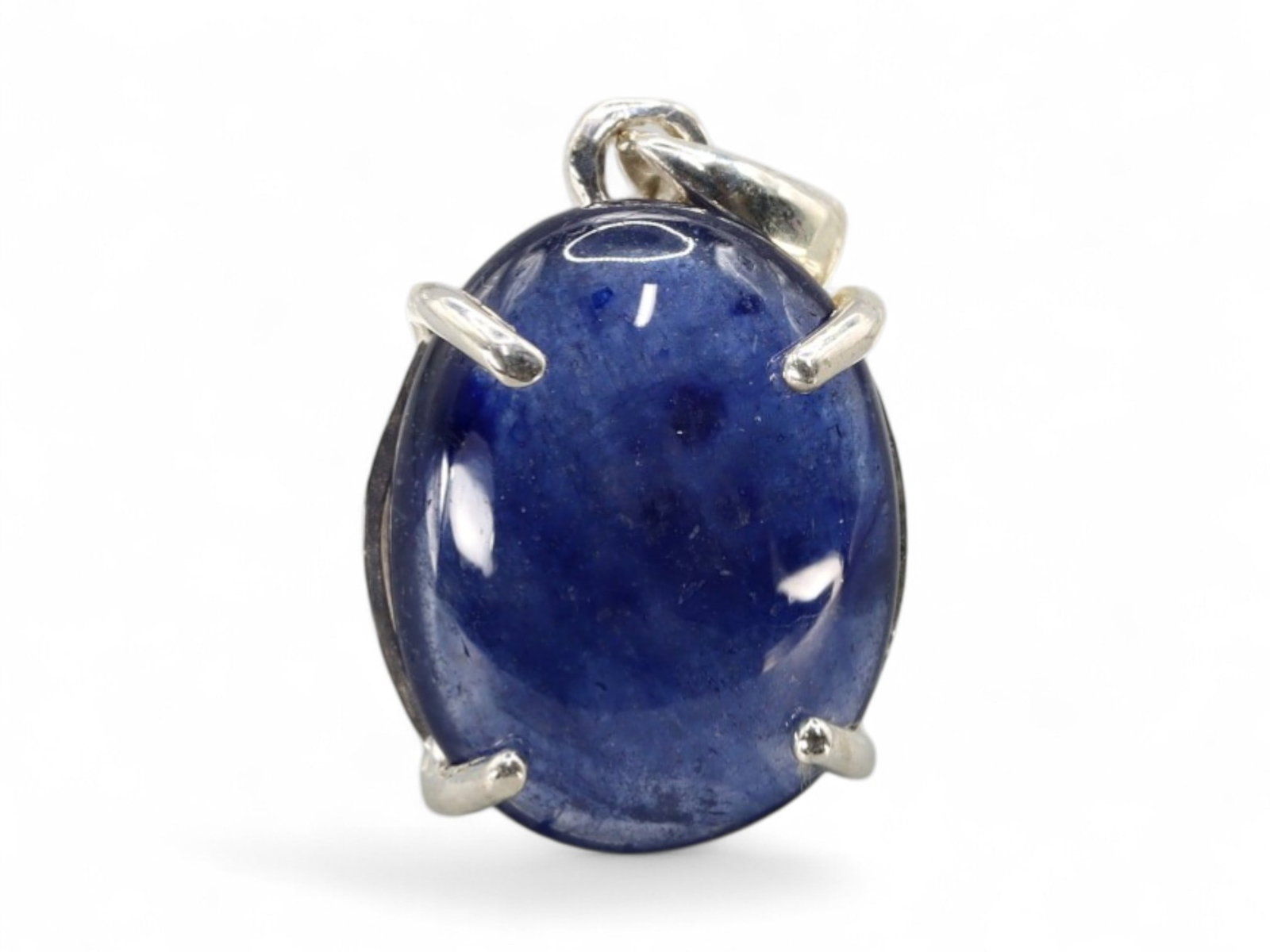 2.27g Natural Blue Sapphire Cabochon Pendant, Silvertone Mount, Stamped 925: With deep oceanic tone and fluid polish, this cabochon-cut blue sapphire is prong-set in a stamped 925 silver pendant mount. The oval stone displays rich navy to violet undertones with gentle surface 