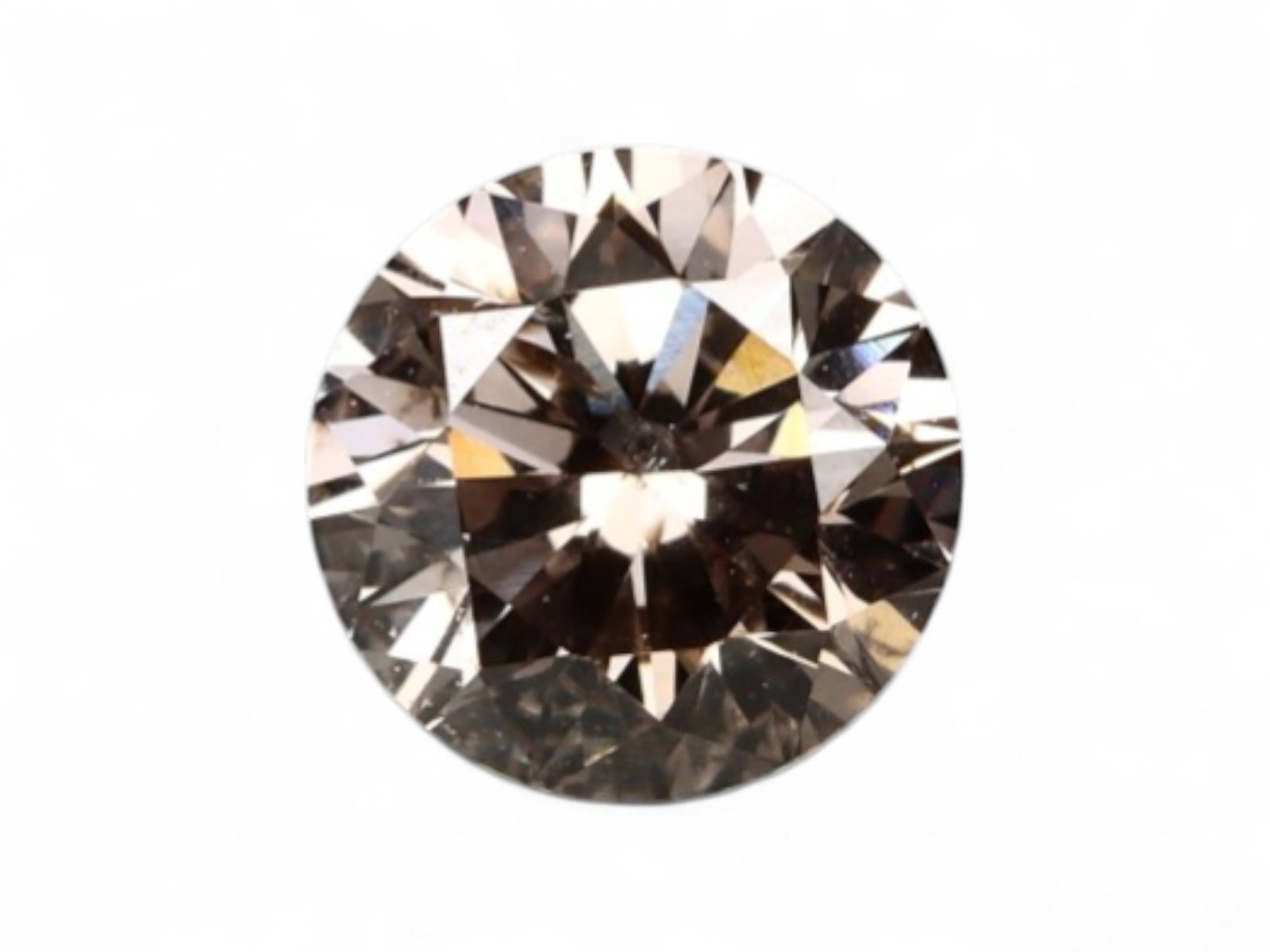 0.31Ct Natural Matrix Earth-Tone Round Brilliant Diamond, 4.1mm: A bold expression of natural inclusions and warm mineral tone, this round brilliant diamond features a richly mottled surface of coffee, slate, and silvery flecks. The internal matrix gives the stone 