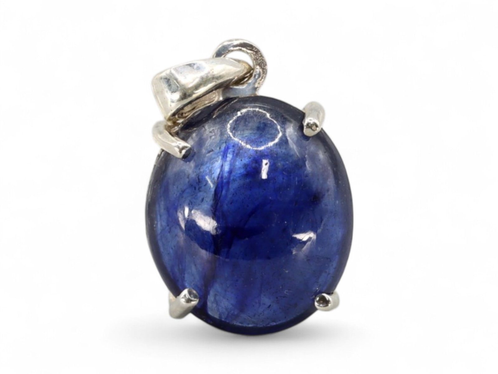 2.76g Natural Blue Sapphire Cabochon Pendant, Silvertone Mount, Stamped 925: With deep oceanic tone and fluid polish, this cabochon-cut blue sapphire is prong-set in a stamped 925 silver pendant mount. The oval stone displays rich navy to violet undertones with gentle surface 