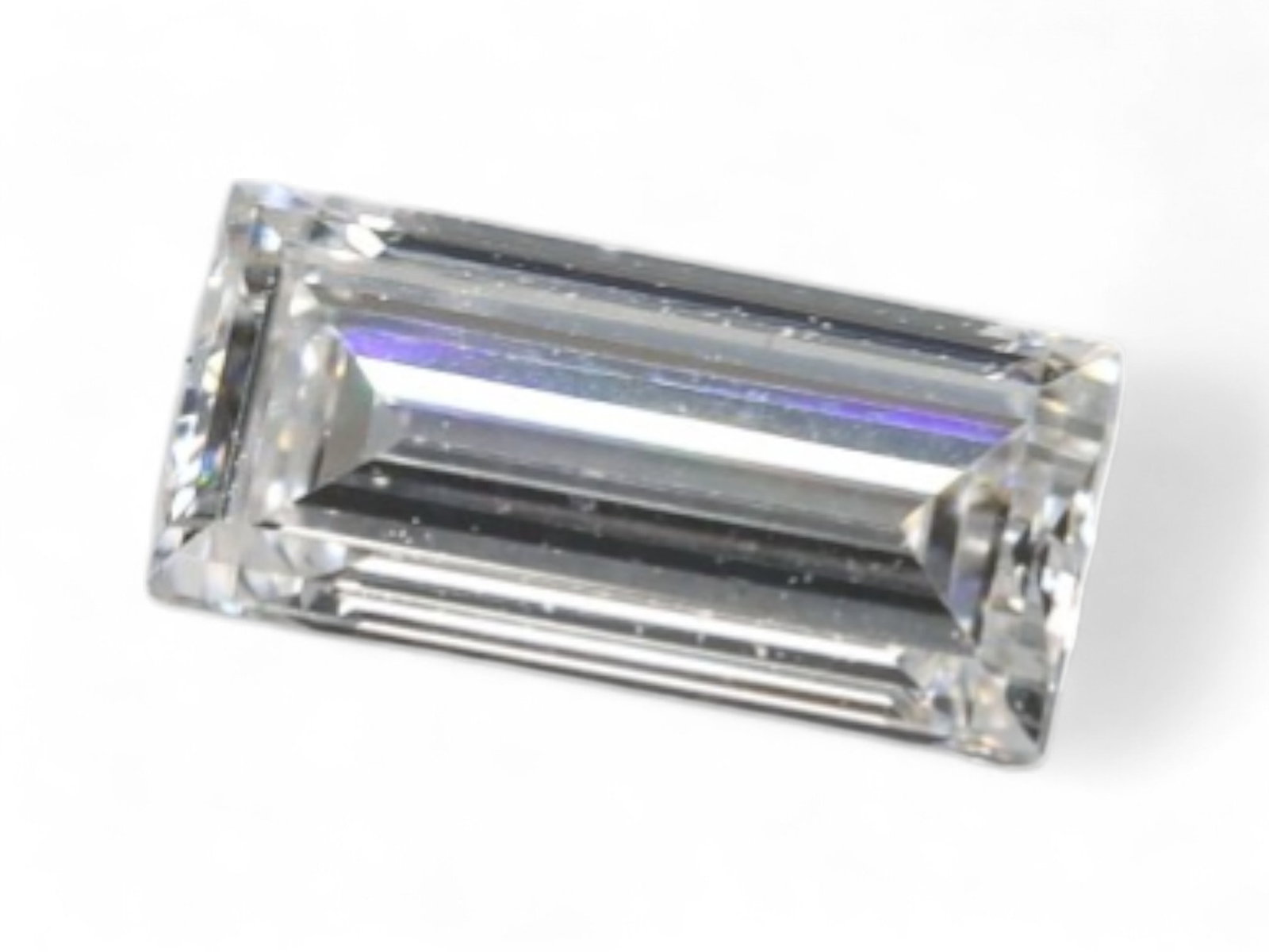 0.28Ct Lab-Grown Baguette Diamond, Step-Cut Precision, 5.6mm: A refined display of clarity and linear elegance, this lab-grown baguette diamond features a crisp step-cut profile and clean geometric symmetry, ideal for contemporary or Deco-inspired mountings. The