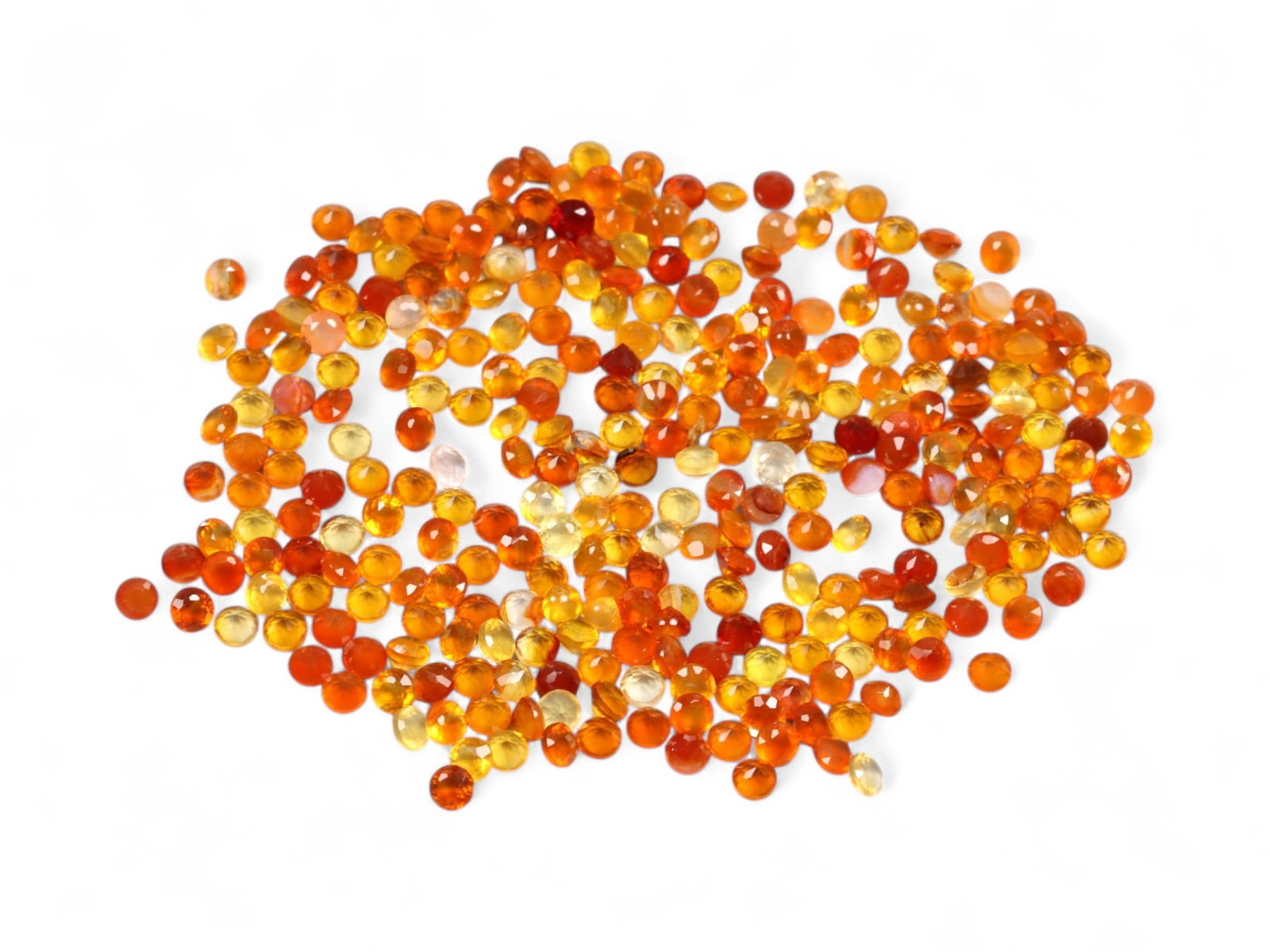 10.25 Carats Round Melee Mandarin Garnet Parcel - Natural Nigerian Stones: This dazzling parcel of round-cut mandarin garnets explodes with citrus brilliance-ranging from fiery tangerine and deep marmalade to soft golden orange and amber. Each stone is precision-cut to maxim