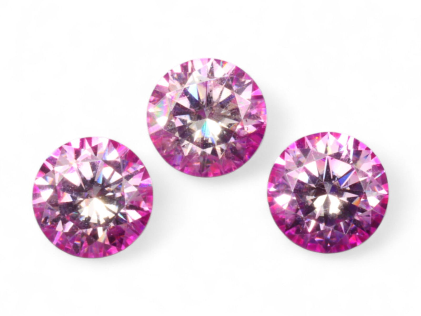 2.76 Carats Vivid Pink Round Moissanite Lot - Precision Cut Loose Stones: This dazzling lot of vivid pink moissanite captures attention with its intense fire and impeccable brilliance. Expertly precision-cut in round brilliant style, each stone radiates with a kaleidoscope