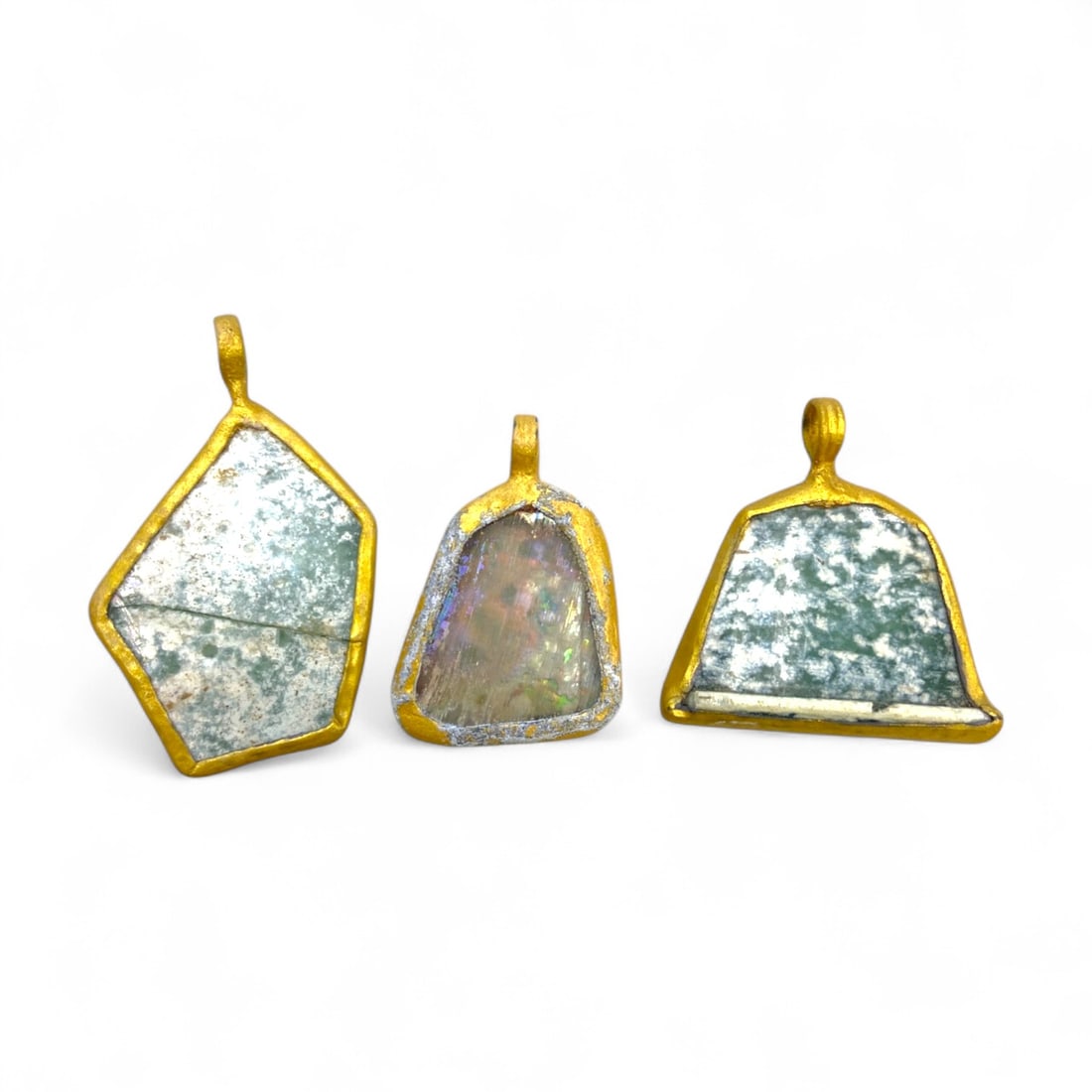 Ancient Roman Iridescent Glass Pendants in Gilt Bronze Frames, c. 1st-3rd Century CE, 19.5g (1 of 2)