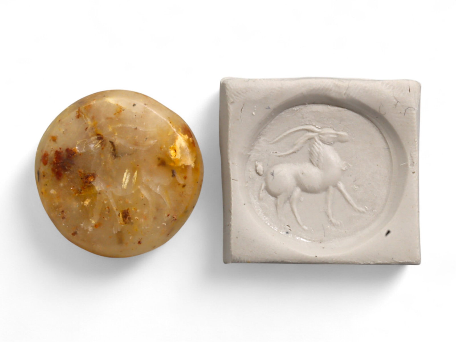 Ancient Near Eastern Ibex Symbol Chalcedony Flat Stamp Seal, c. 3rd-2nd Millennium BCE, 5g: This finely carved chalcedony flat stamp seal, dating back to the 3rd-2nd millennium BCE, originates from the ancient Near East, likely Mesopotamia or Elam. Weighing approximately 5 grams (0.18 oz), 2