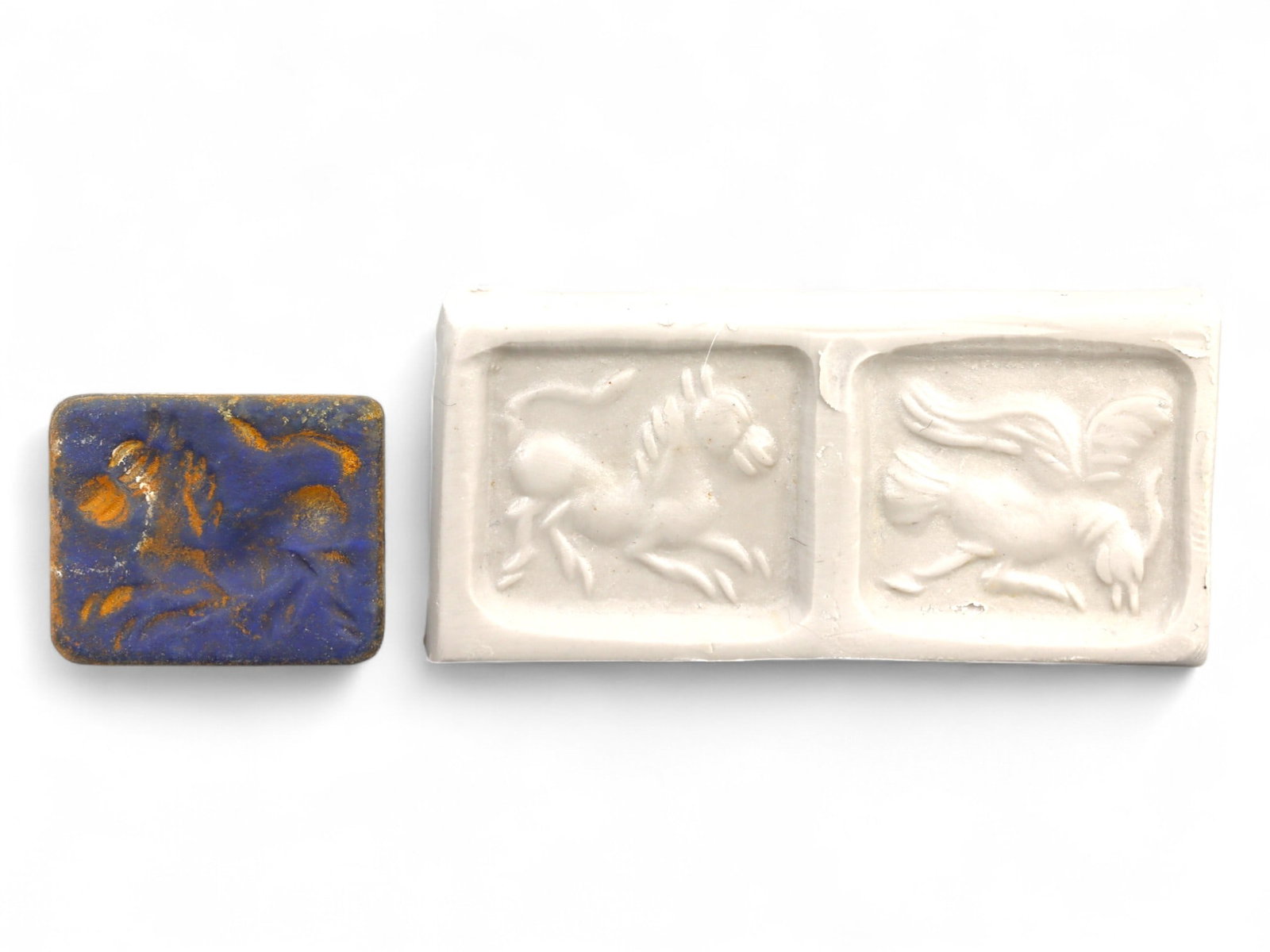 Ancient Elamite Bifacial Stamp Seal of Winged Creatures in Lapis Lazuli, c. 2500-1800 BCE, 4g: This visually stunning bifacial stamp seal, hewn from richly pigmented lapis lazuli with natural golden pyrite inclusions, dates to the Elamite-Indus interaction period between 2500 and 1800 BCE. Meas