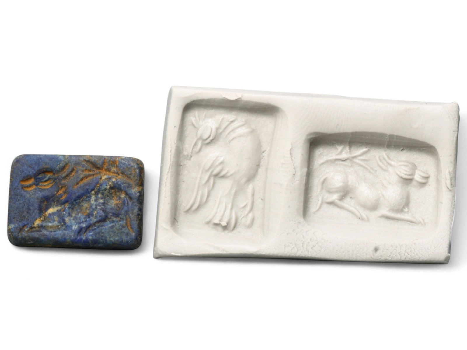 Ancient Elamite Bifacial Lapis Lazuli Stamp Seal with Bird and Ibex Motifs, c. 2500-1800 BCE, 4.87g: This rare bifacial stamp seal, carved from richly veined lapis lazuli, embodies the artistic and symbolic depth of the Elamite-Indus interaction period, c. 2500-1800 BCE. On one side, a reclining ante