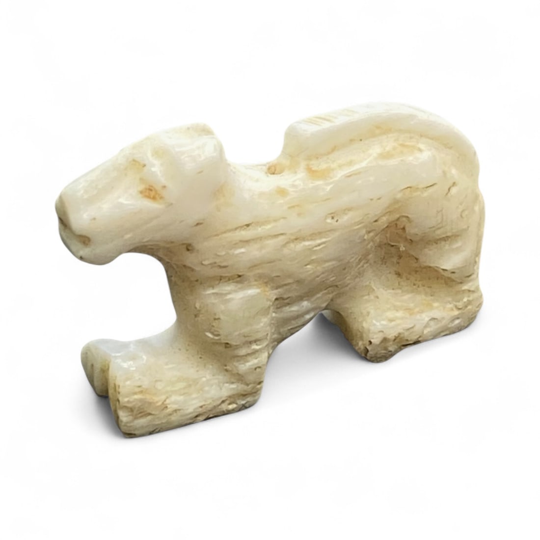 Ancient Egyptian Anubis Guardian Bone Amulet, c. 1500-600 BCE, 6g: This delicately carved bone amulet depicts Anubis, the jackal-headed god of the afterlife, guardian of tombs and protector of souls on their journey through the Duat - the ancient Egyptian underworld.