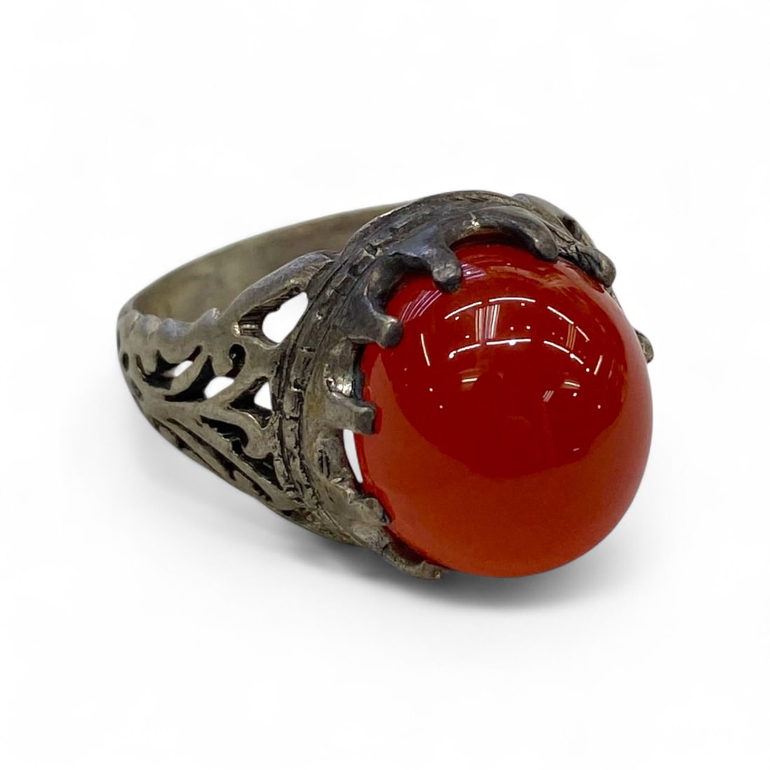 Antique Ottoman Revival Foliate Filigree Carnelian Dome Silver Ring, Early 20th Century, 9g, US 10: This elegant silver ring showcases the opulence and symbolic beauty characteristic of early 20th-century Ottoman Revival jewelry. At its center is a high-domed carnelian cabochon, prized throughout th