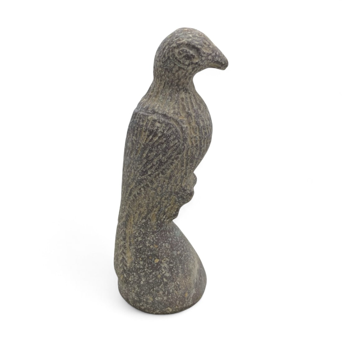 Ancient Egyptian Falcon-Form Stone Figurine, c. 664-332 BCE, 257g: This finely carved stone figurine, weighing 257 grams and standing 5.12 inches (13 cm) tall, represents a falcon, an iconic and sacred bird in ancient Egyptian religion. The falcon was most often asso