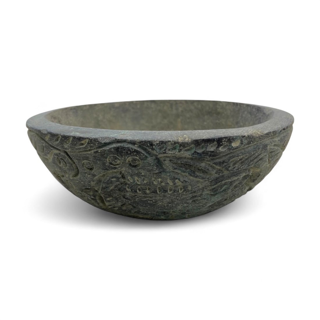Ancient Jiroft Floral Motif Schist Bowl, c. 3rd Millennium BCE, 203g: This finely carved schist bowl originates from the ancient Jiroft culture, flourishing in southeastern Iran during the 3rd millennium BCE. The Jiroft civilization is celebrated for its mastery of hard