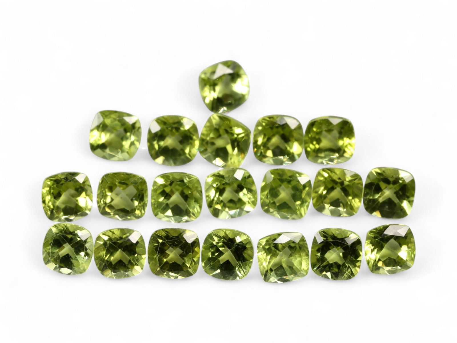 13.27 Carats Bright Green Peridot Parcel - Natural Cushion-Cut Stones: This well-matched parcel of cushion-cut peridot gems dazzles with a crisp, chartreuse-green brilliance. Each stone is precisely faceted to maximize light return, creating a vibrant play of reflections