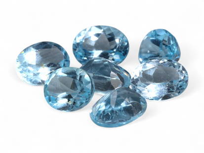 16.63 Carats Icy Blue Aquamarine Oval Lot - Natural Brazilian Stones: This refined parcel of aquamarine gemstones radiates a serene, icy blue hue with elegant transparency and fluid brilliance. The oval cuts emphasize each stone's clarity and depth, catching and reflect