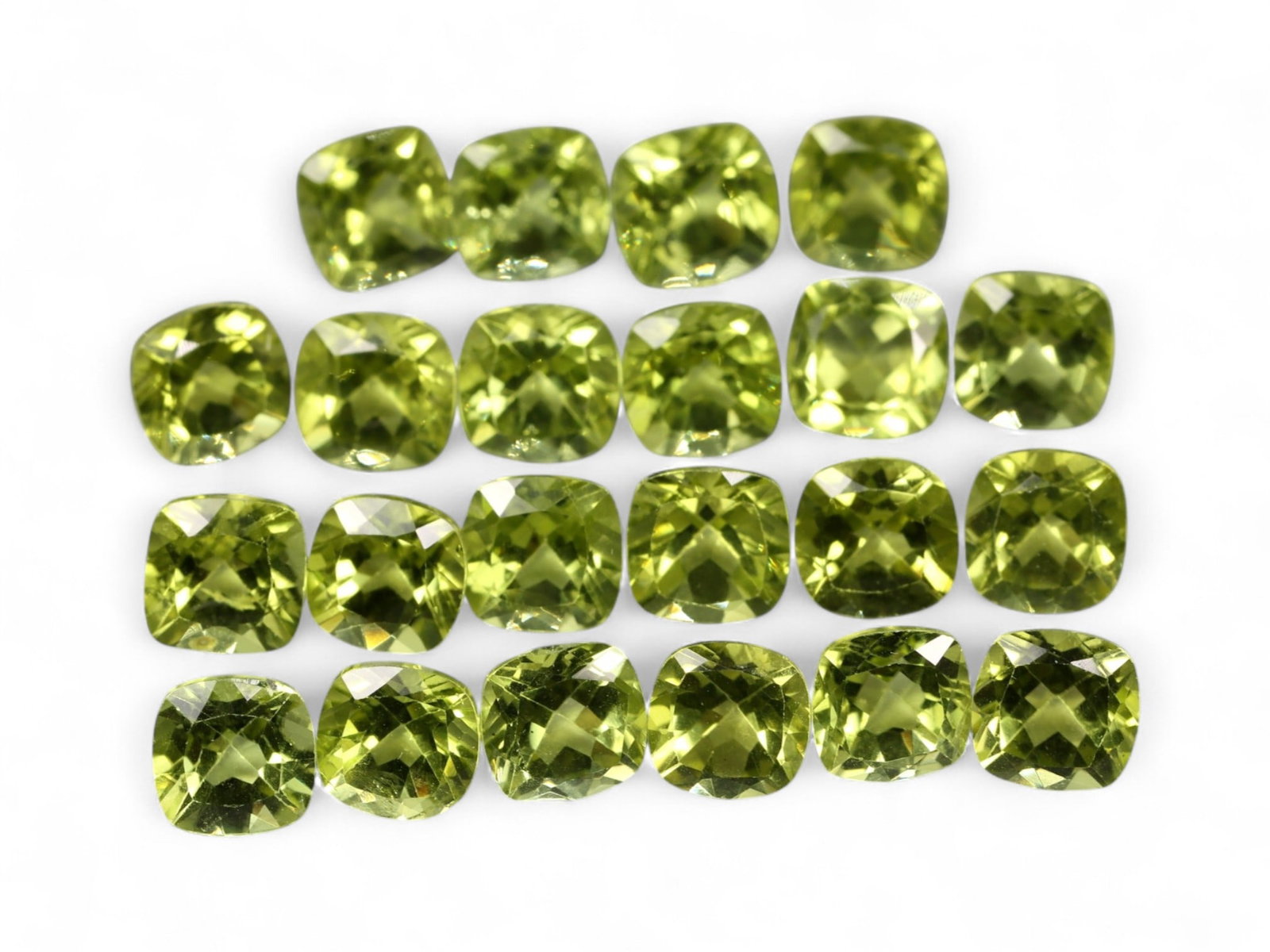 14.54 Carats Bright Green Peridot Parcel - Natural Cushion-Cut Stones: This well-matched parcel of cushion-cut peridot gems dazzles with a crisp, chartreuse-green brilliance. Each stone is precisely faceted to maximize light return, creating a vibrant play of reflections