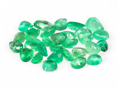 3.08 Carats Vivid Green Emerald Pear Lot - Natural Colombian Stones: This lot of pear-shaped emeralds shines with the lush, garden-green glow for which Colombian stones are celebrated. Each gem captures a slightly varied tone within the vivid green spectrum, enhanced b