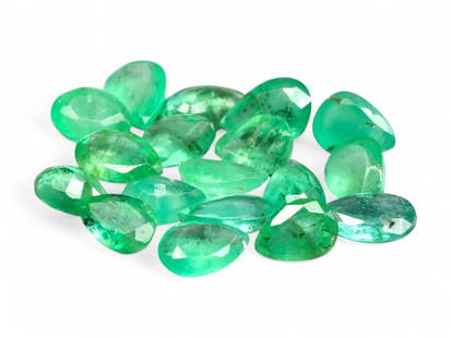 3.65 Carats Vivid Green Emerald Pear Lot - Natural Colombian Stones: This lot of pear-shaped emeralds shines with the lush, garden-green glow for which Colombian stones are celebrated. Each gem captures a slightly varied tone within the vivid green spectrum, enhanced b