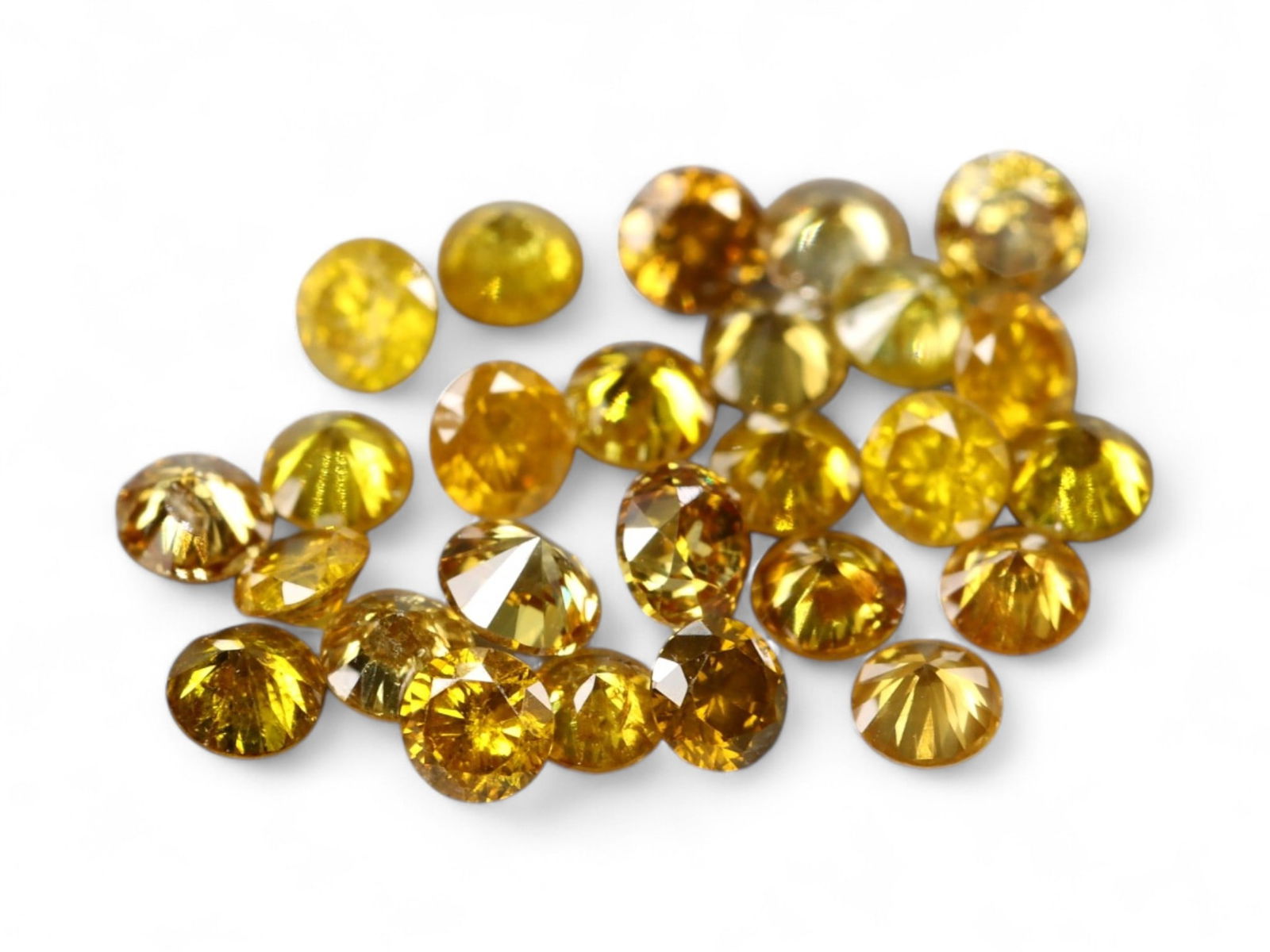 0.53 Carats Golden Yellow Diamond Round Lot - 25 Stones, 1.7 mm Each, Natural: This vibrant lot of 25 round-cut diamonds, totaling 0.53 carats, bursts with rich golden-yellow hues that radiate warmth and brilliance. Each stone is precision-cut to maximize sparkle despite its pet
