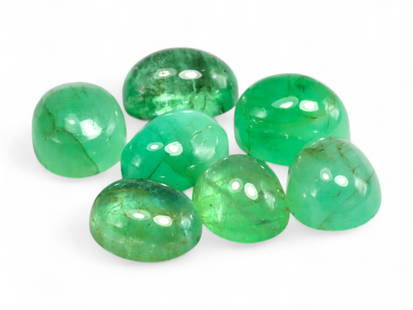 3.12 Carats Vivid Green Emerald Cabochon Lot - Natural Zambian Stones: This charming lot of emerald cabochons glows with a lush, vivid green tone that immediately draws the eye. The smooth, polished domes offer a soft luster, highlighting the natural internal features th