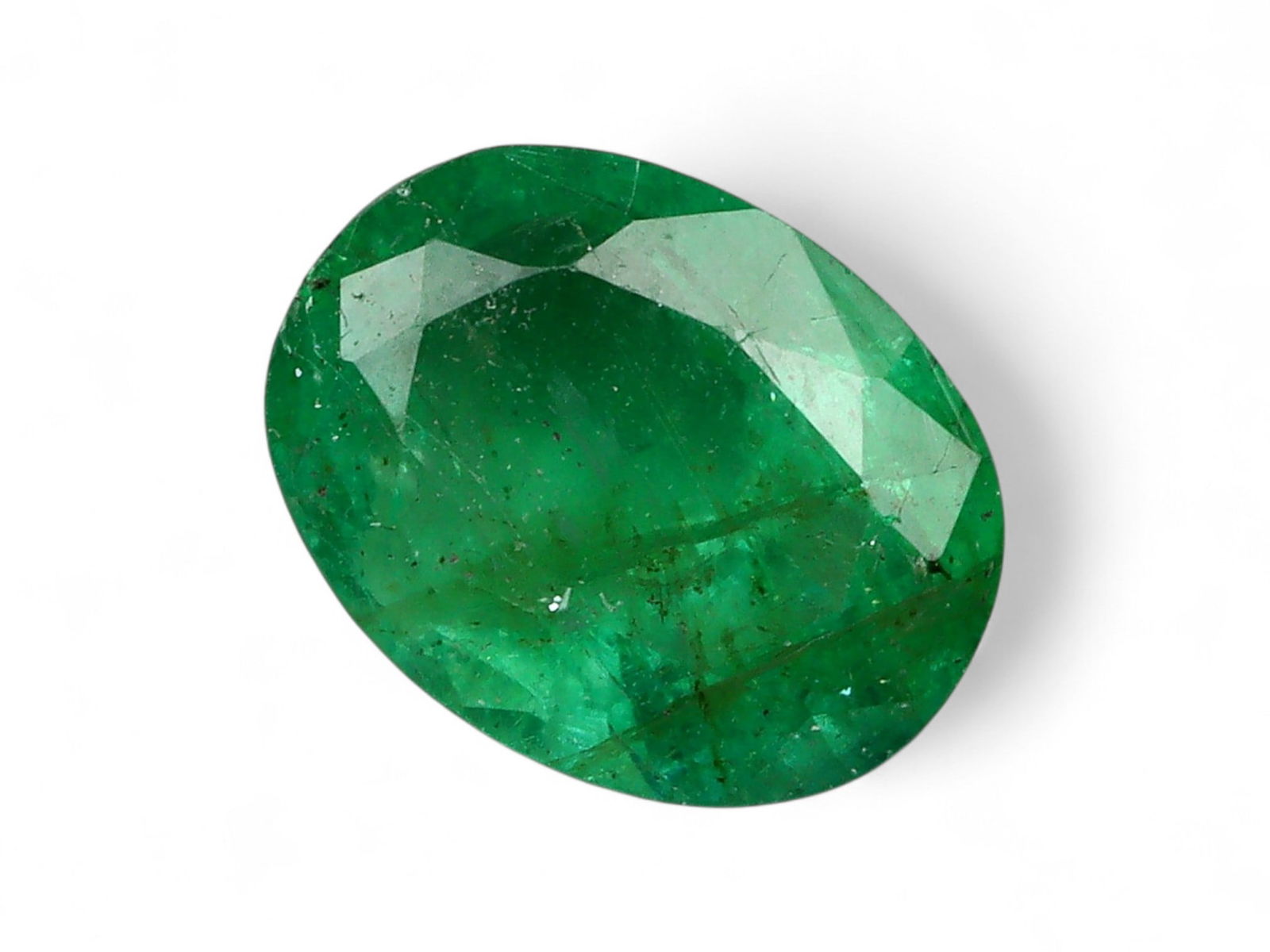0.94 Carats Vivid Green Emerald Oval - Natural Zambian Stone: This oval-cut emerald captivates with a deep, vibrant green hue, a defining characteristic of Zambia's finest gemstone production. Its symmetrical oval form offers a timeless silhouette, while the wel