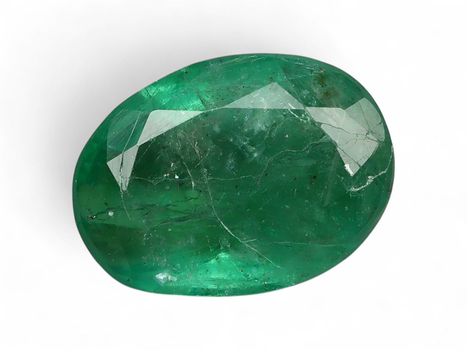 1.88 Carats Vivid Green Emerald Oval - Natural Zambian Stone: This oval-cut emerald captivates with a deep, vibrant green hue, a defining characteristic of Zambia's finest gemstone production. Its symmetrical oval form offers a timeless silhouette, while the wel