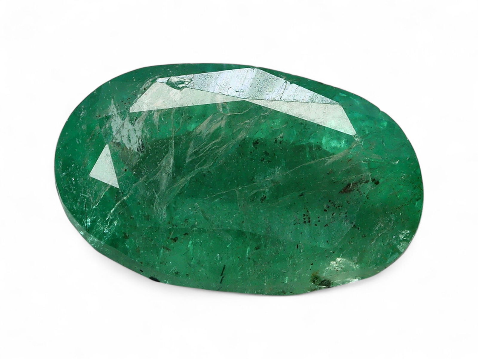 2.83 Carats Vivid Green Emerald Oval - Natural Zambian Stone: This oval-cut emerald captivates with a deep, vibrant green hue, a defining characteristic of Zambia's finest gemstone production. Its symmetrical oval form offers a timeless silhouette, while the wel