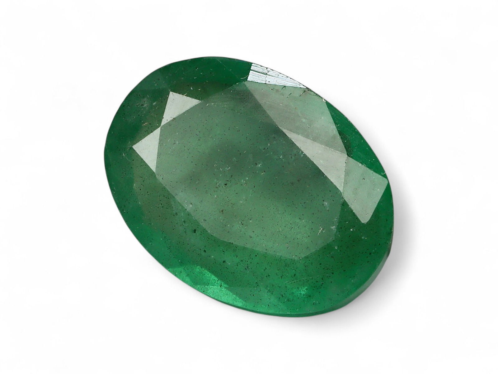 2.06 Carats Vivid Green Emerald Oval - Natural Zambian Stone: This oval-cut emerald captivates with a deep, vibrant green hue, a defining characteristic of Zambia's finest gemstone production. Its symmetrical oval form offers a timeless silhouette, while the wel
