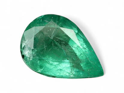 0.82 Carats Vivid Green Emerald Pear - Natural Zambian Stone: This elegant pear-shaped emerald radiates with a vibrant green hue, characteristic of Zambia's finest gems. The gem's smooth taper and well-balanced faceting allow light to flow gracefully across the