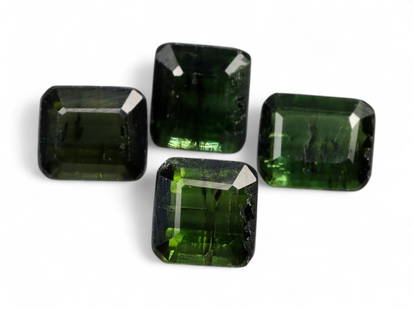 5.38 Carats Deep Forest Green Tourmaline Lot - Natural Nigerian Stones: This refined lot of green tourmalines displays a rich, forest-green hue with subtle variations that catch the light and reveal flashes of lighter green from within. Cut in classic emerald step cuts, t